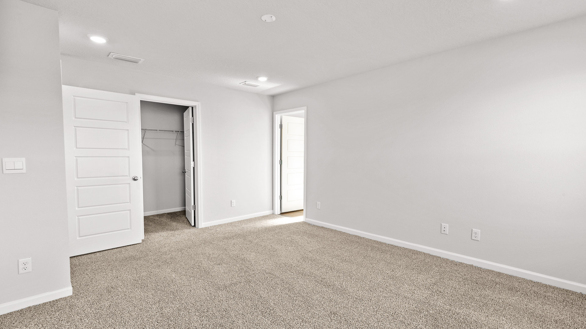 Large primary with closet and ensuite bathroom in The Reserve at Carr Bridge.