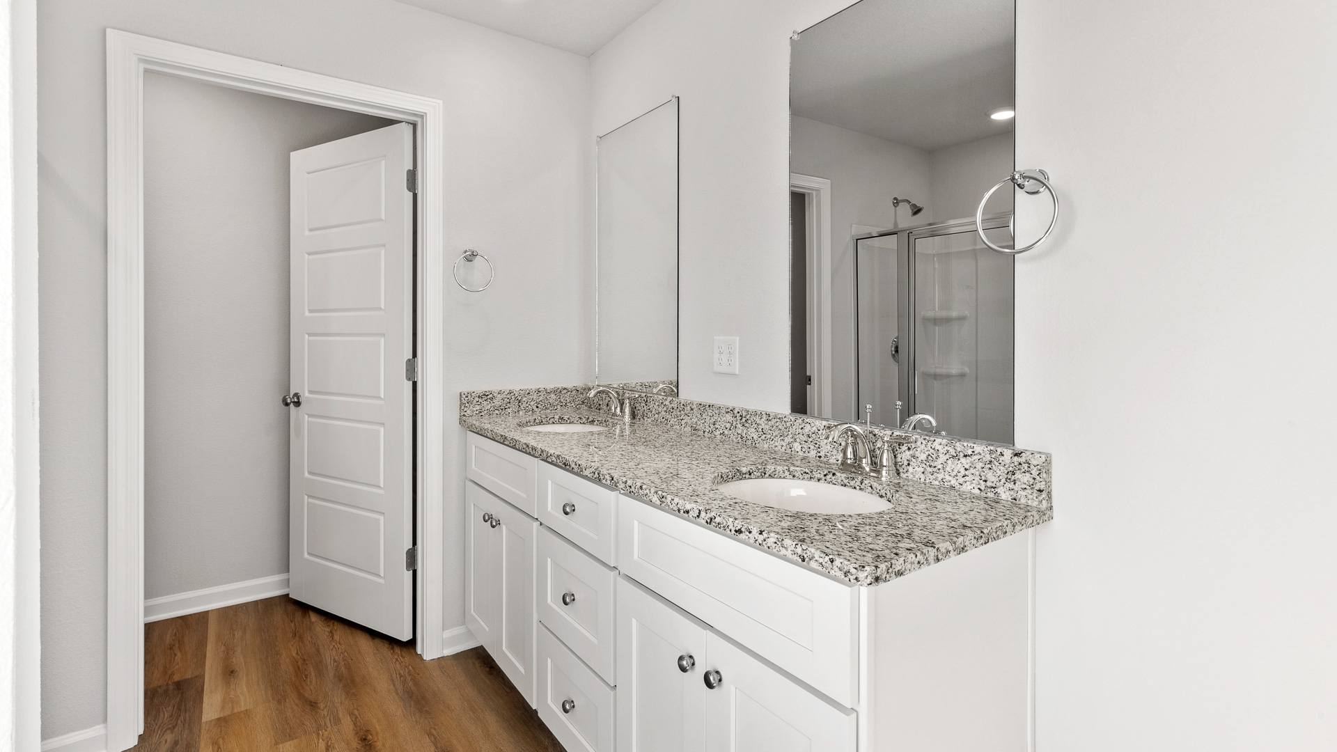 Double vanity in the primary ensuite bathroom in the Booth floorplan.