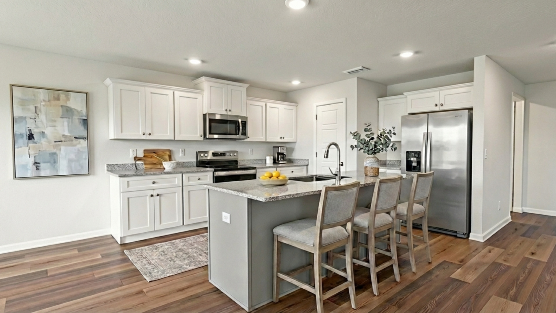 Kitchen with gray island.