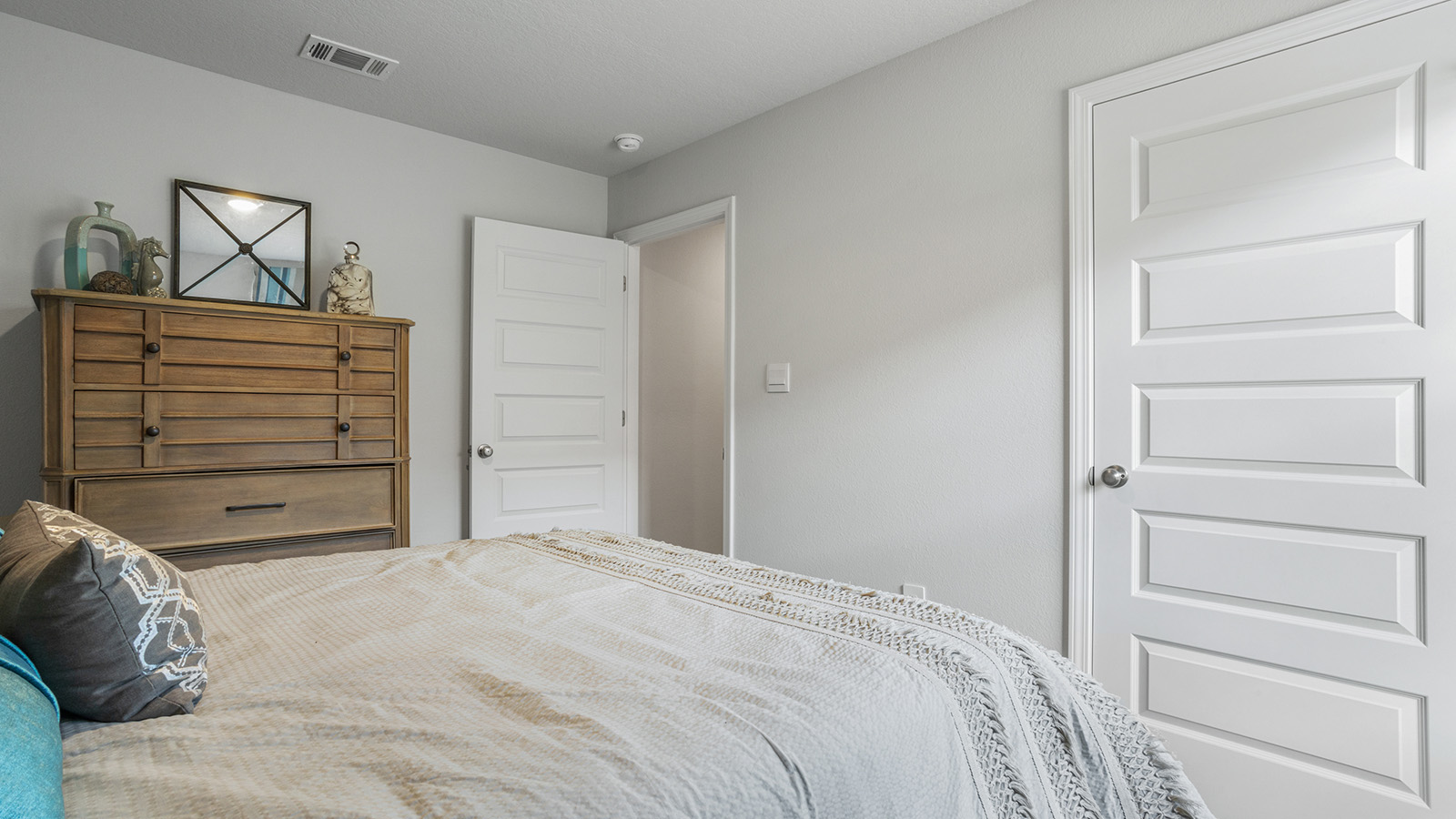Neutrally decorated additional bedroom
