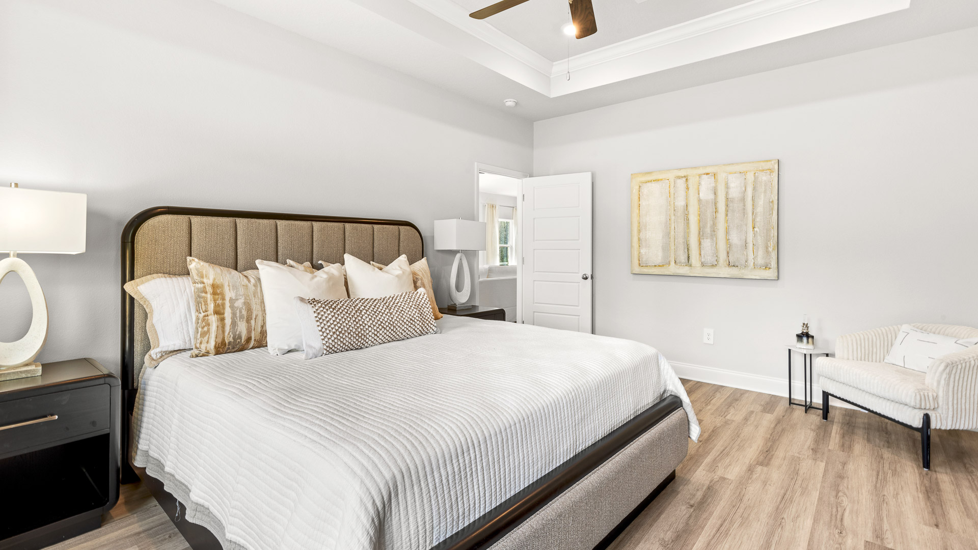 Isabella primary bedroom with tray ceiling.