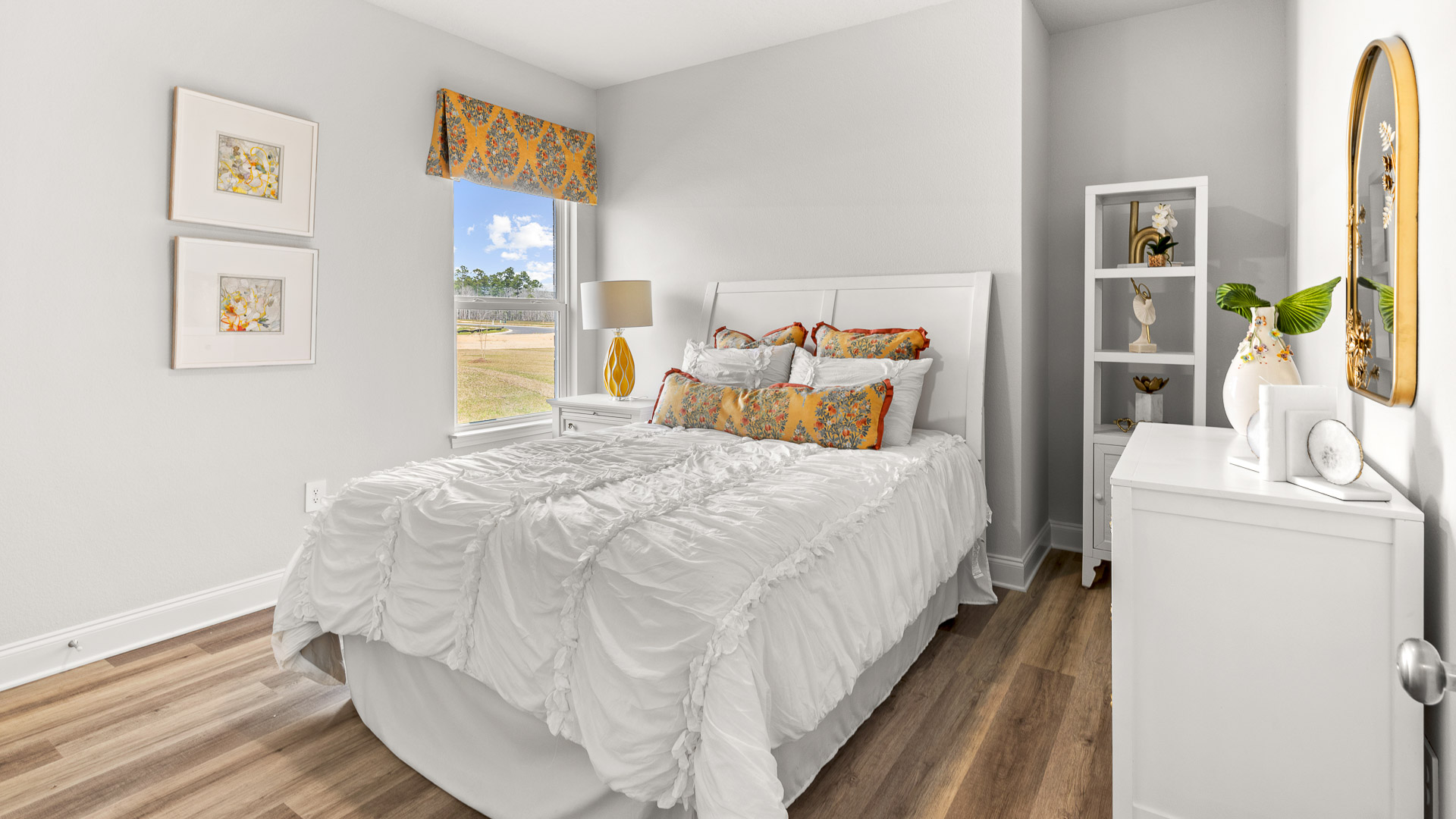 Guest bedroom in the Isabella new construction home.