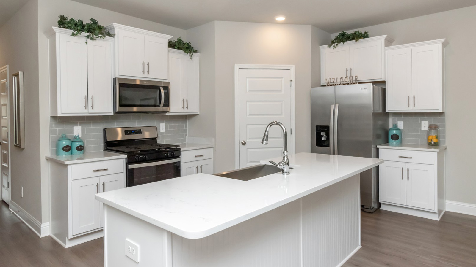 Beautiful white kitchen in a new construction home.