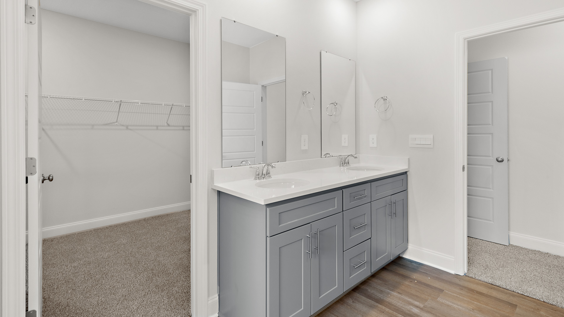 Primary bathroom entrance to walk in closet