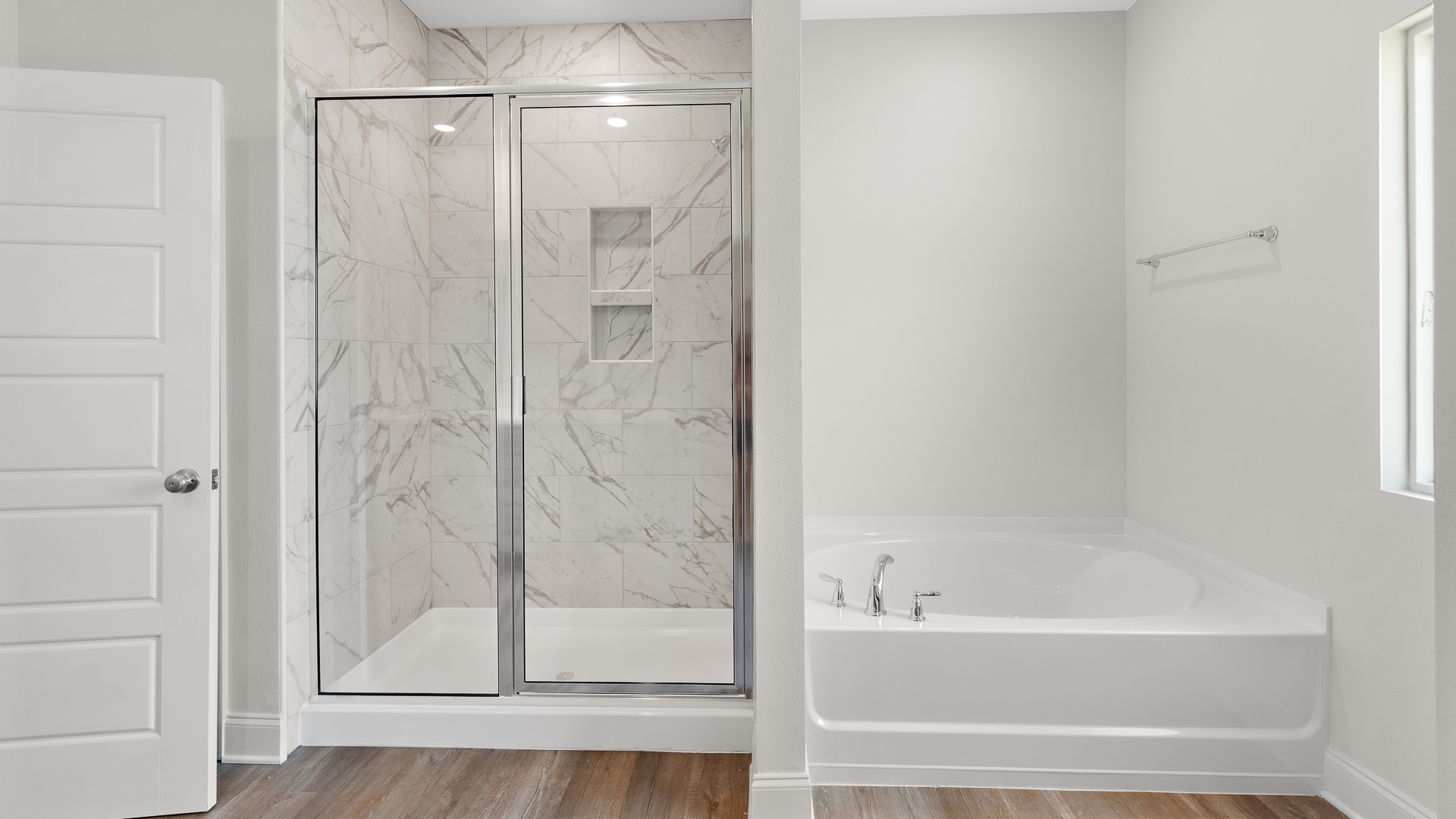 Walk in closet with soaking tub