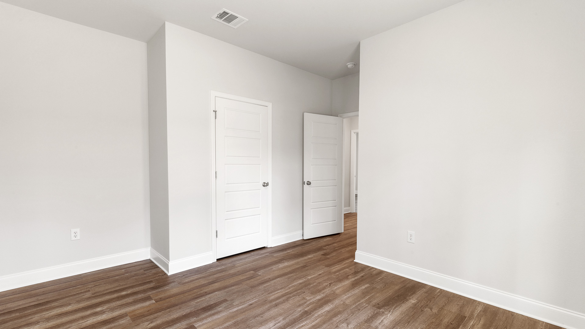 Spacious bedroom inside the Victoria