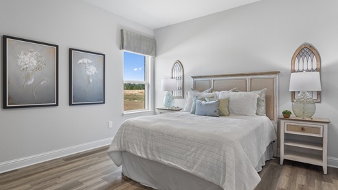 Brightly decorated additional bedroom.