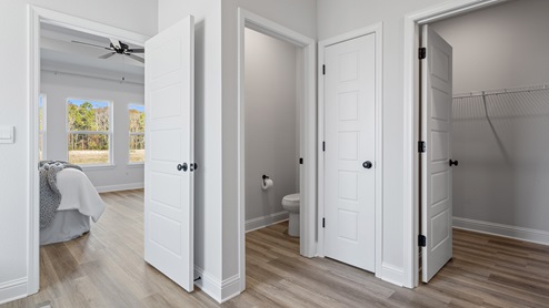 Hallway view of bedrooms.