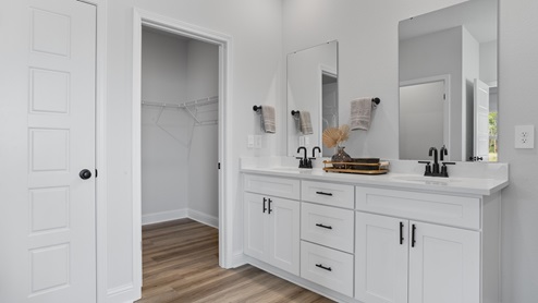 Side view of spacious primary bathroom.