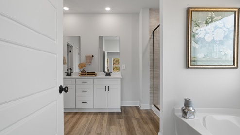 Open floor of primary bathroom.