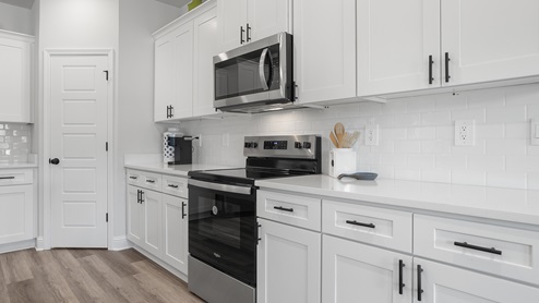 View of cabinet space inside the kitchen.