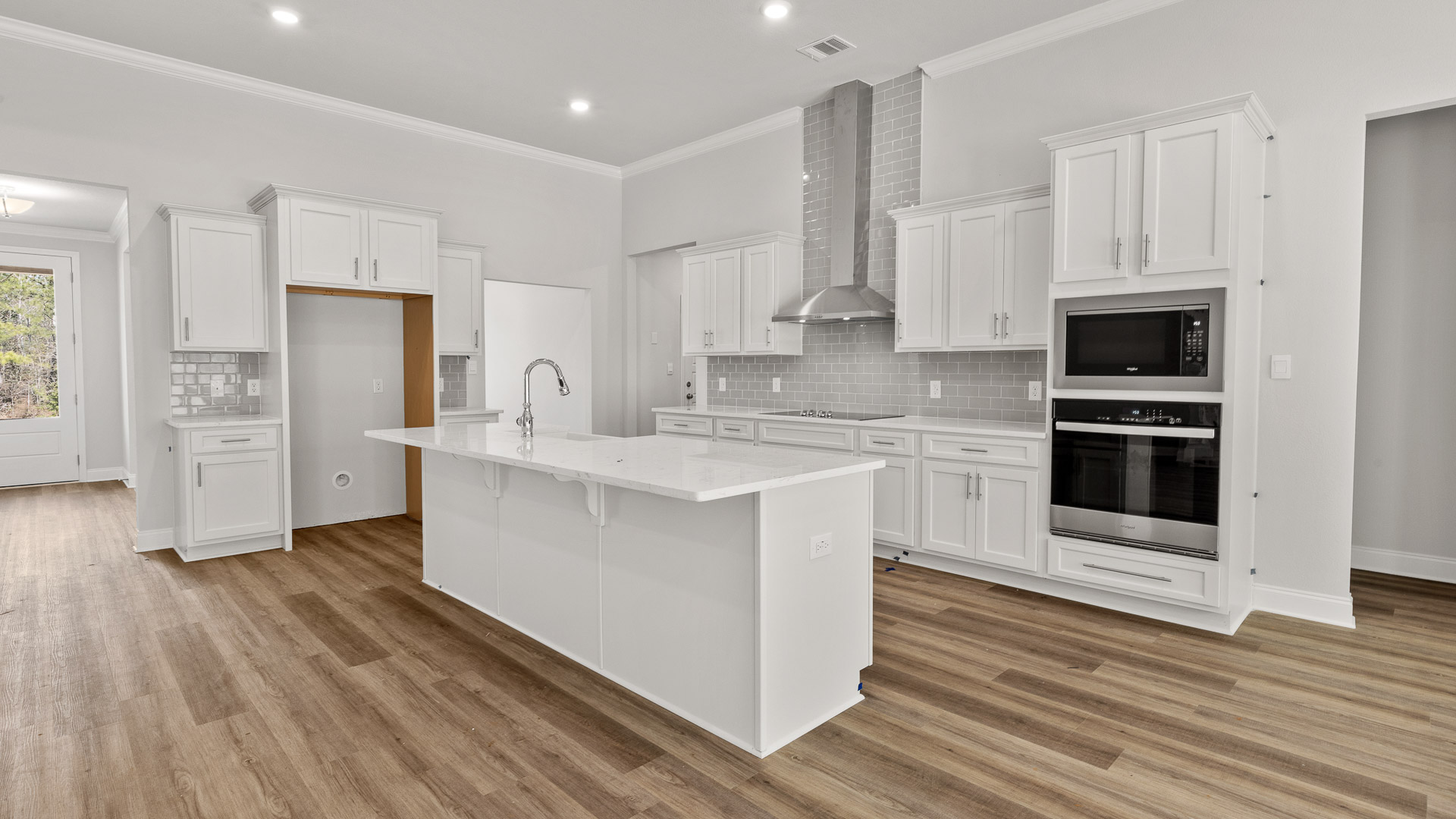 Open concept kitchen in the Kingston plan.