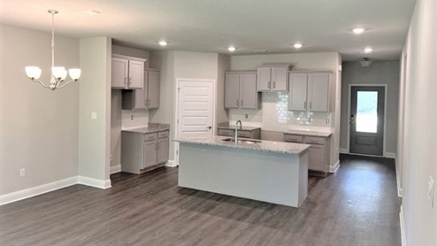 The Arlington open concept kitchen and living area.