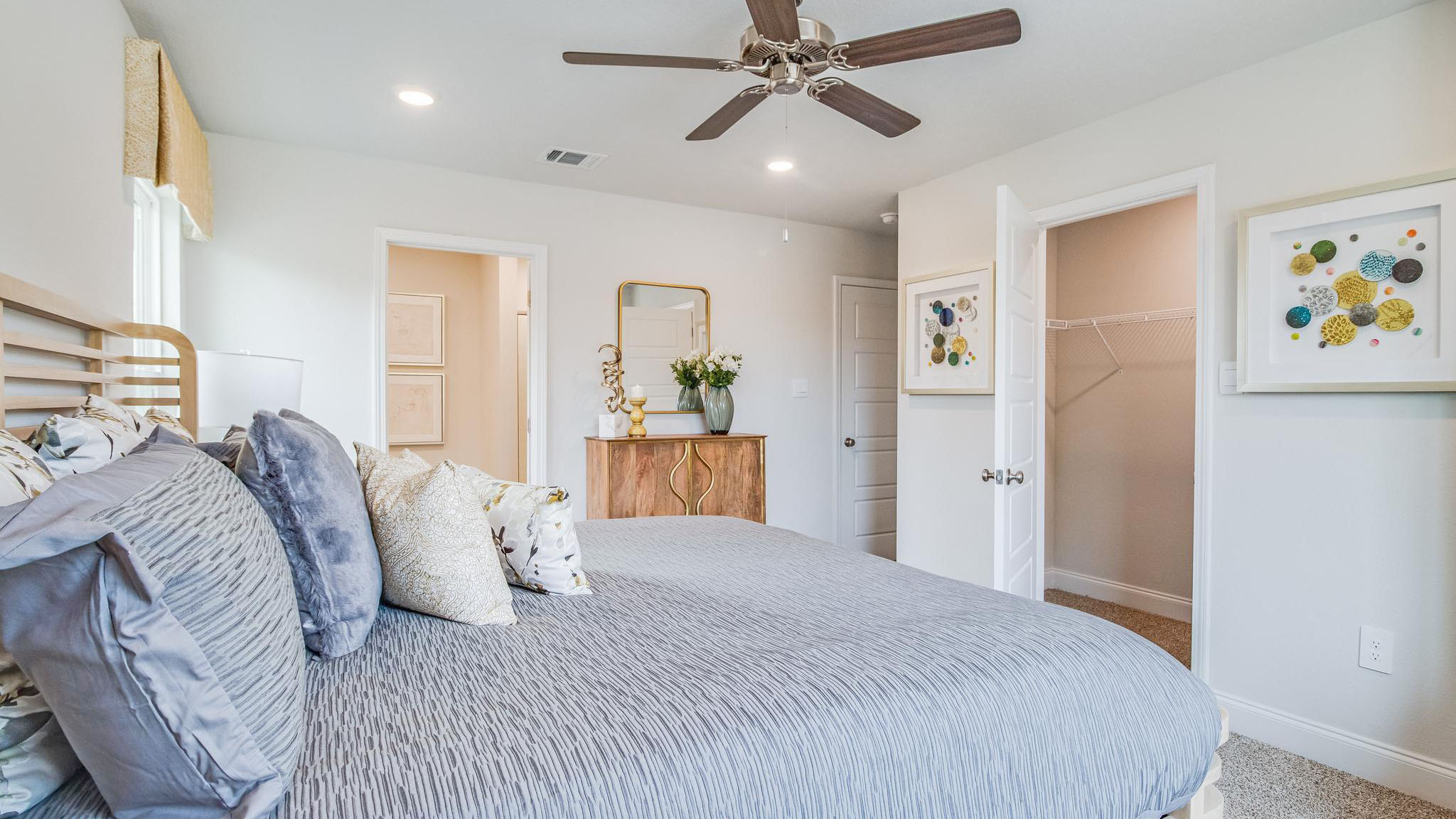 Primary Bedroom with closet and entrance to bathroom.