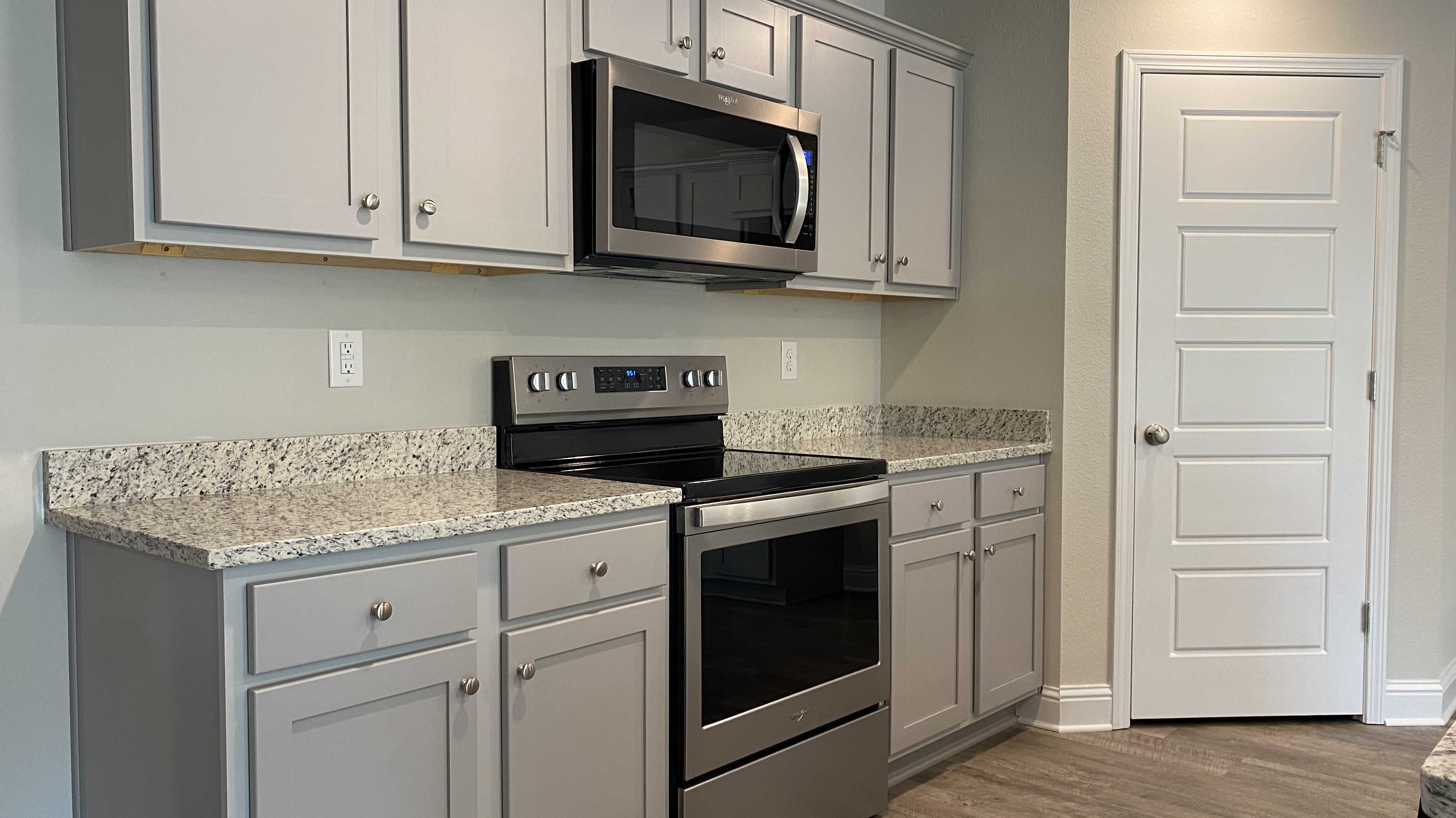 Sleek kitchen appliances inside the Cali