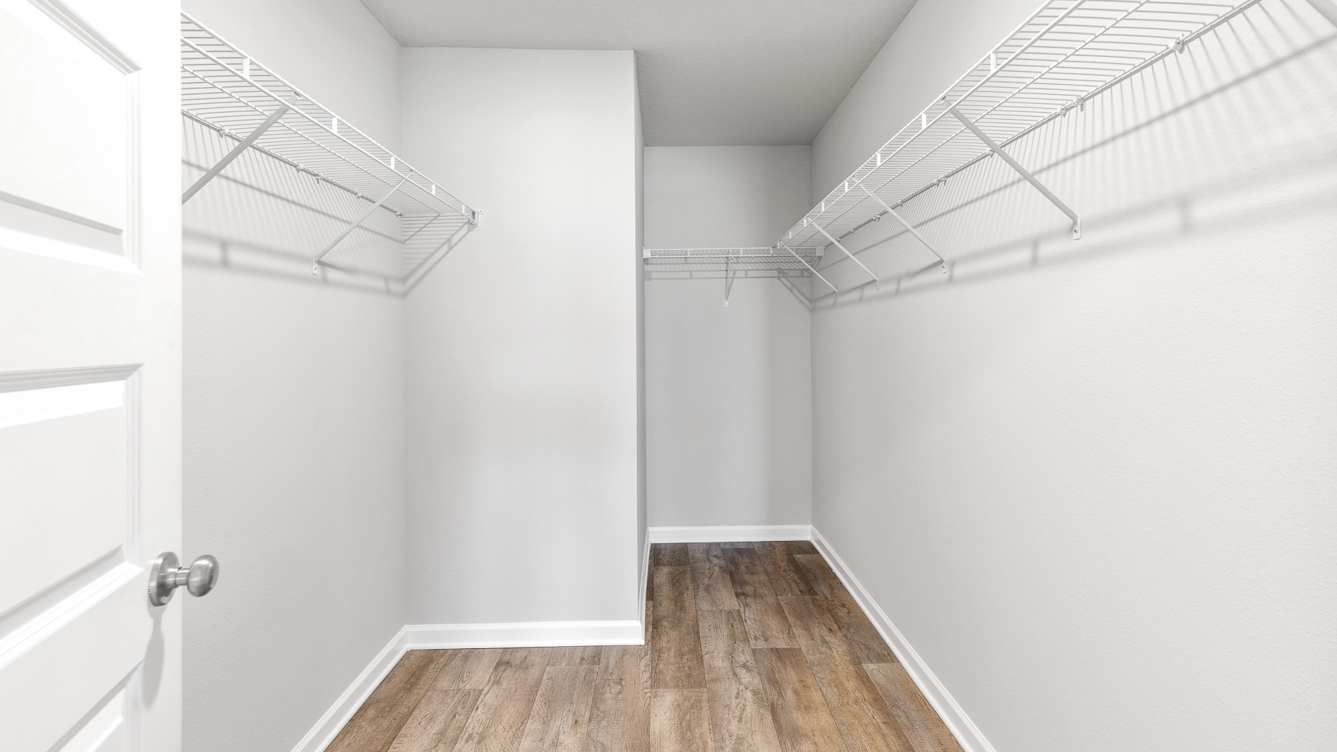 Walk in closet inside the primary suite