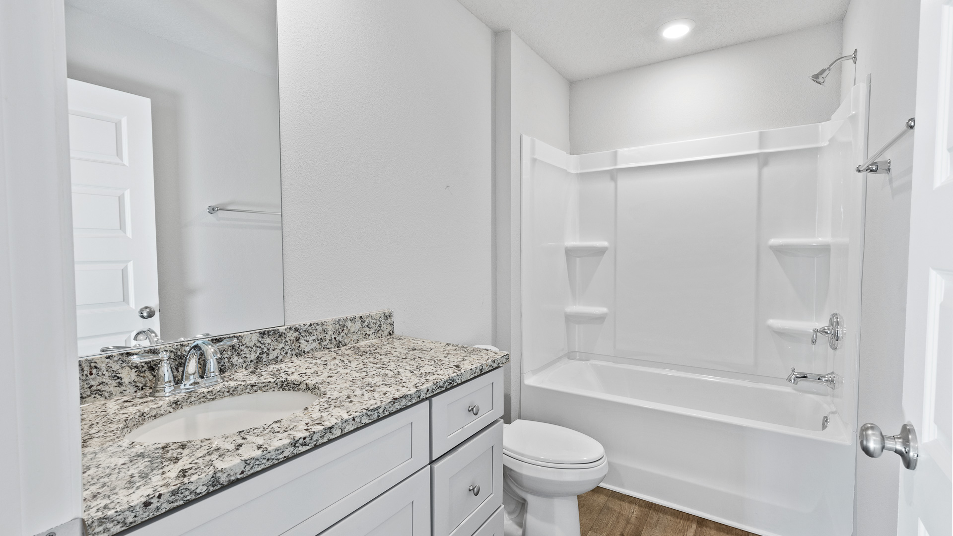Sleek and bright bathroom inside the hallway