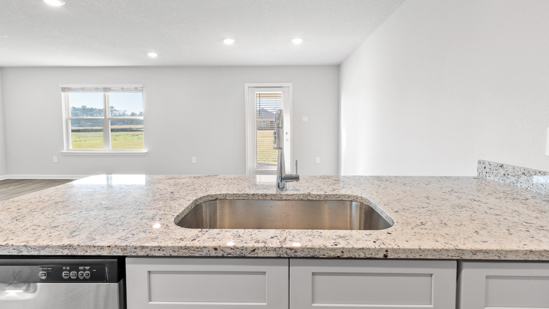 Sleek kitchen island with gourmet sink