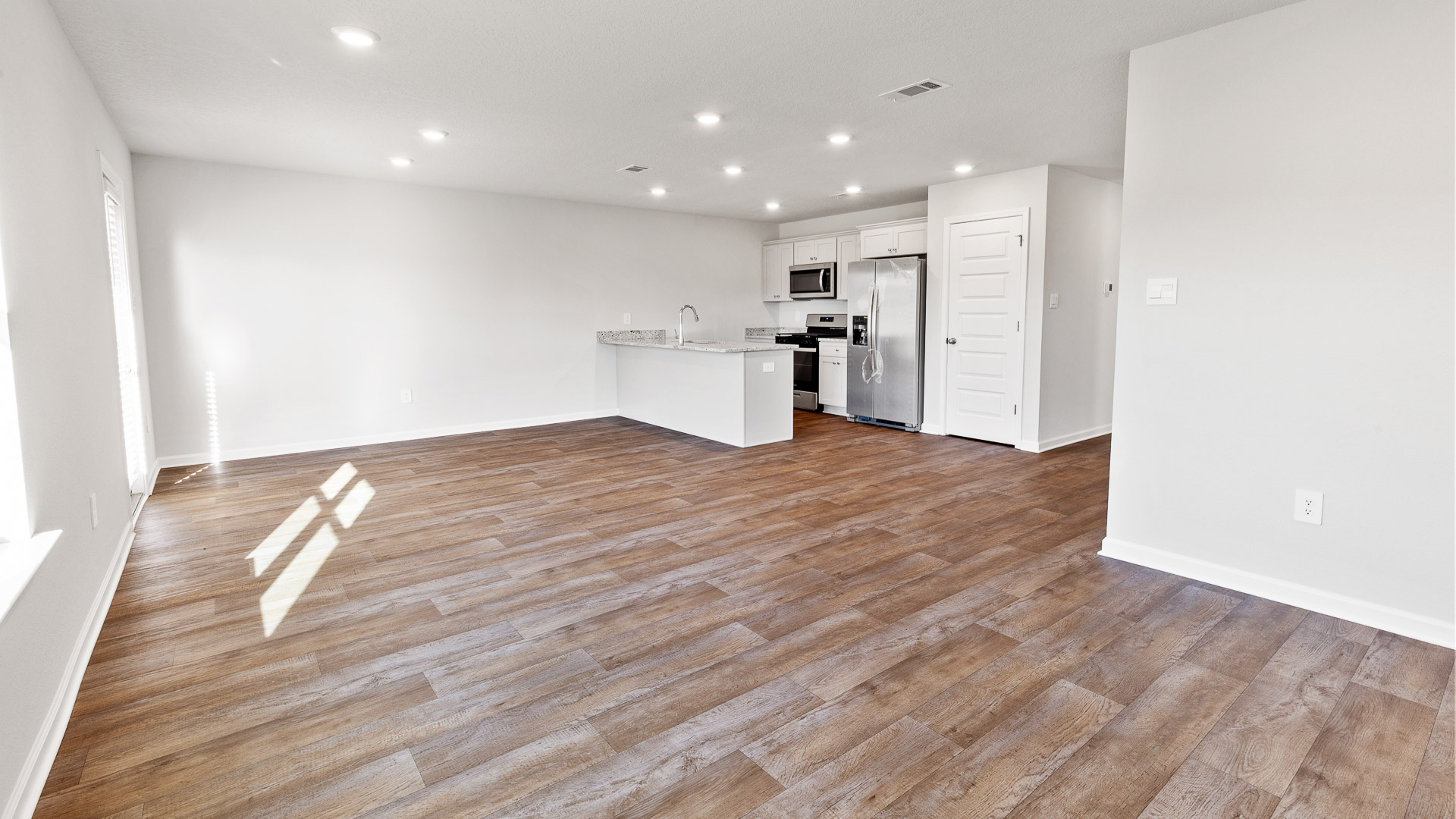 Open living area connected to kitchen