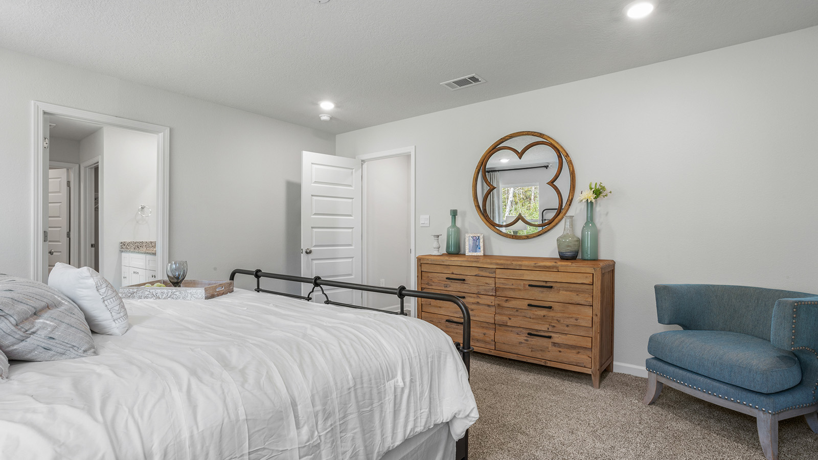 Spacious primary bedroom inside the Cairn floorplan.