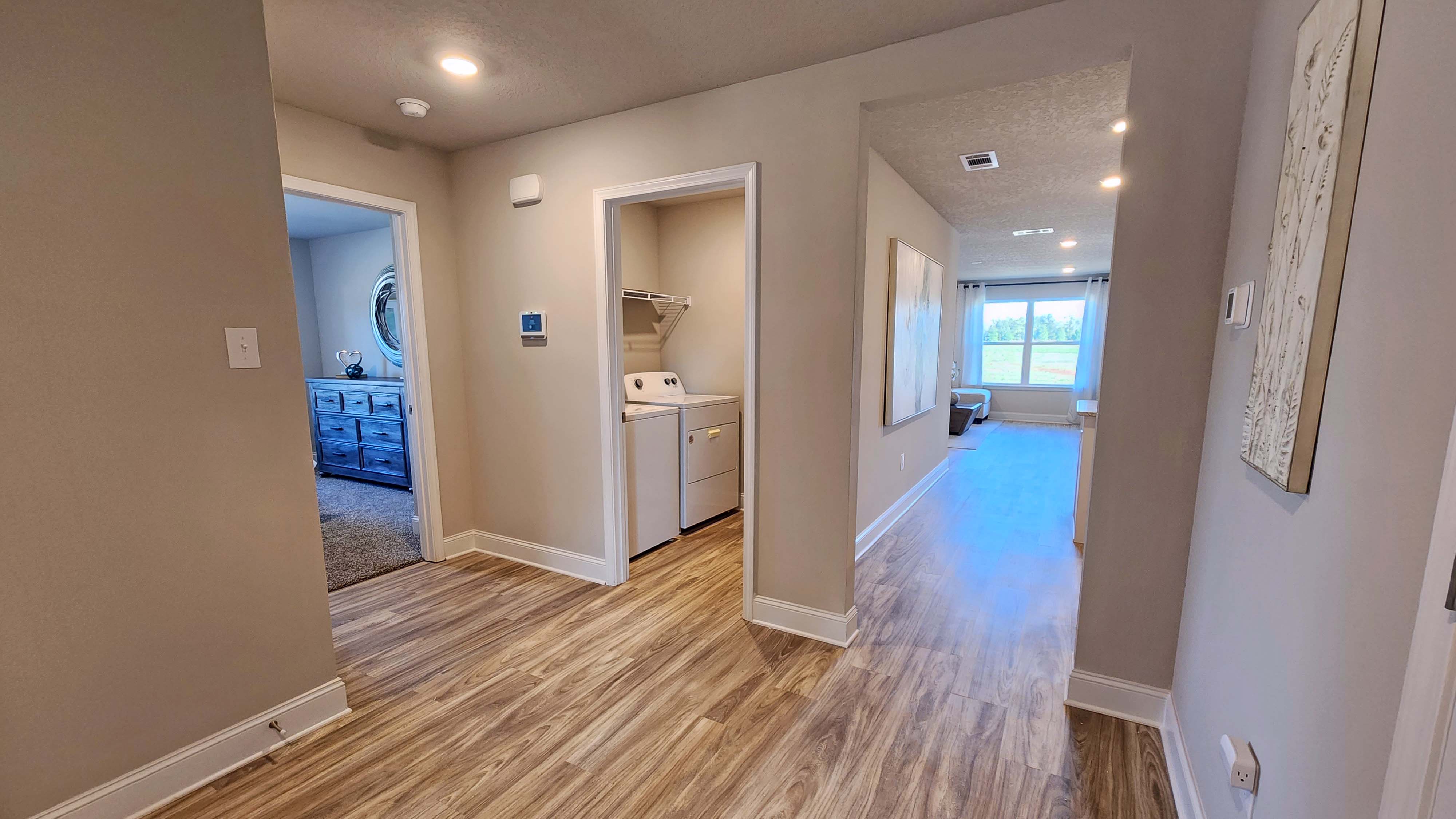 Hallway leading to bedrooms in a Cali.
