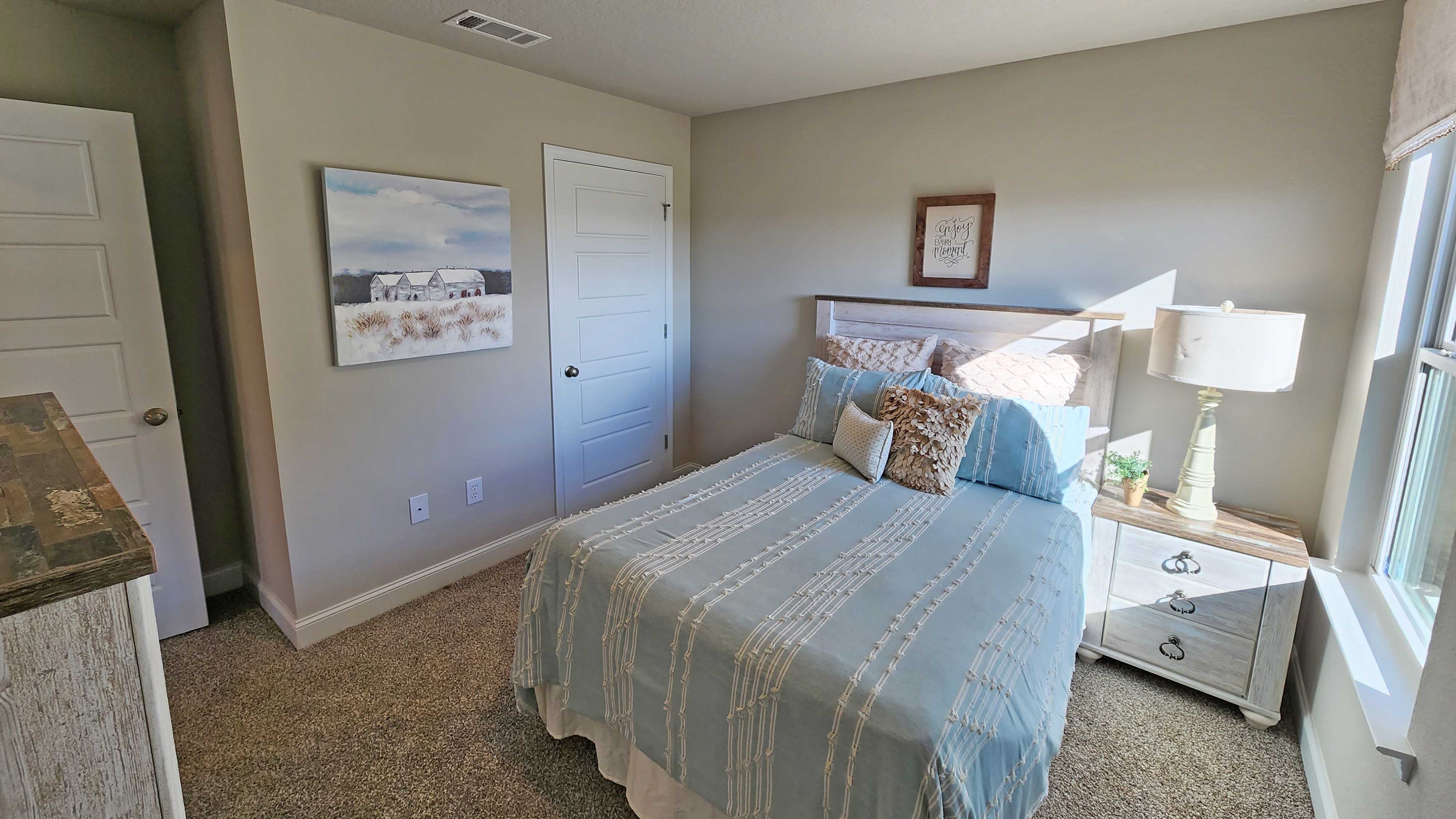 Guest bedroom in a new home in Gulfport, Mississippi.