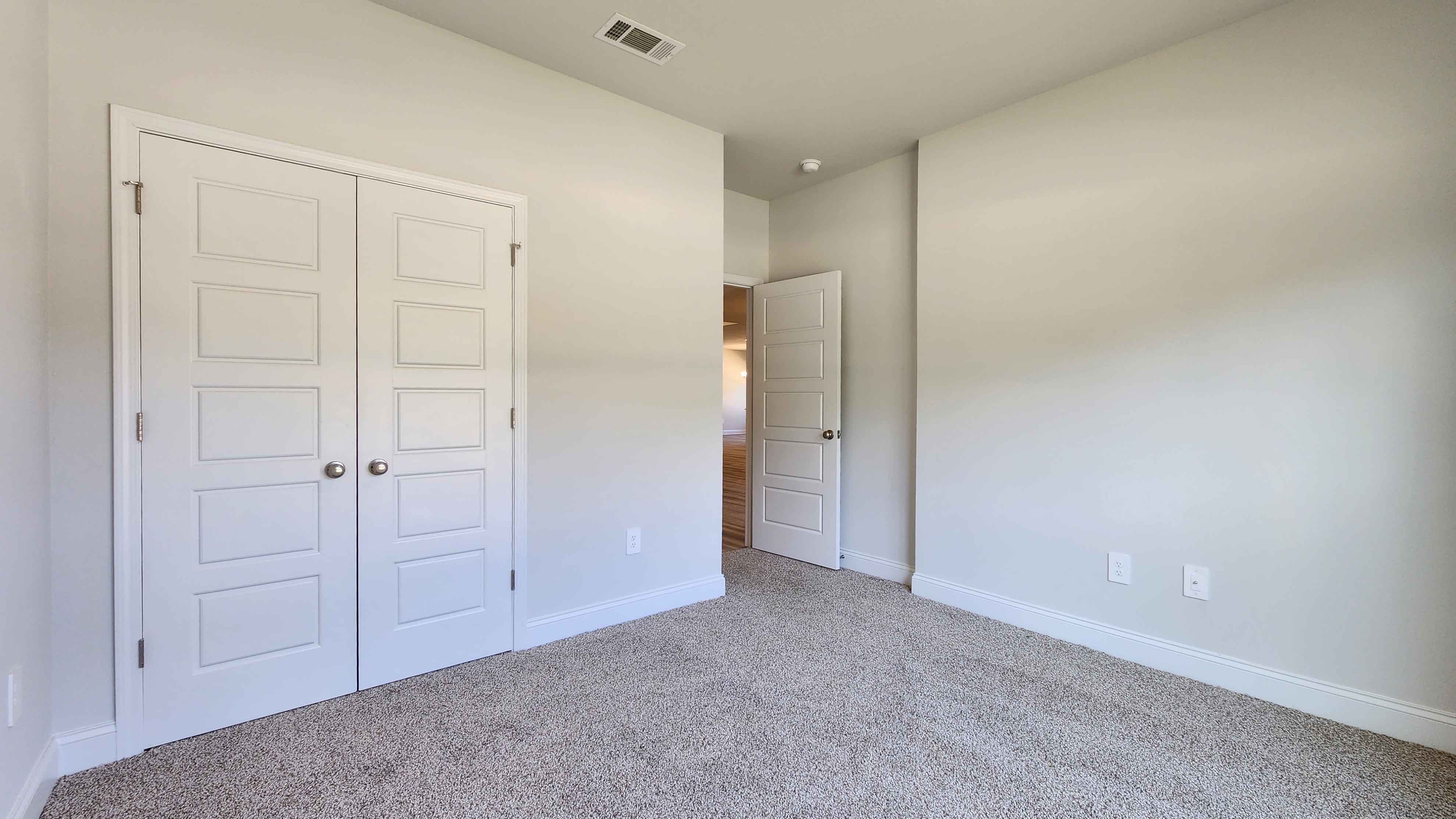 The Destin guest bedroom in Crane Landing.