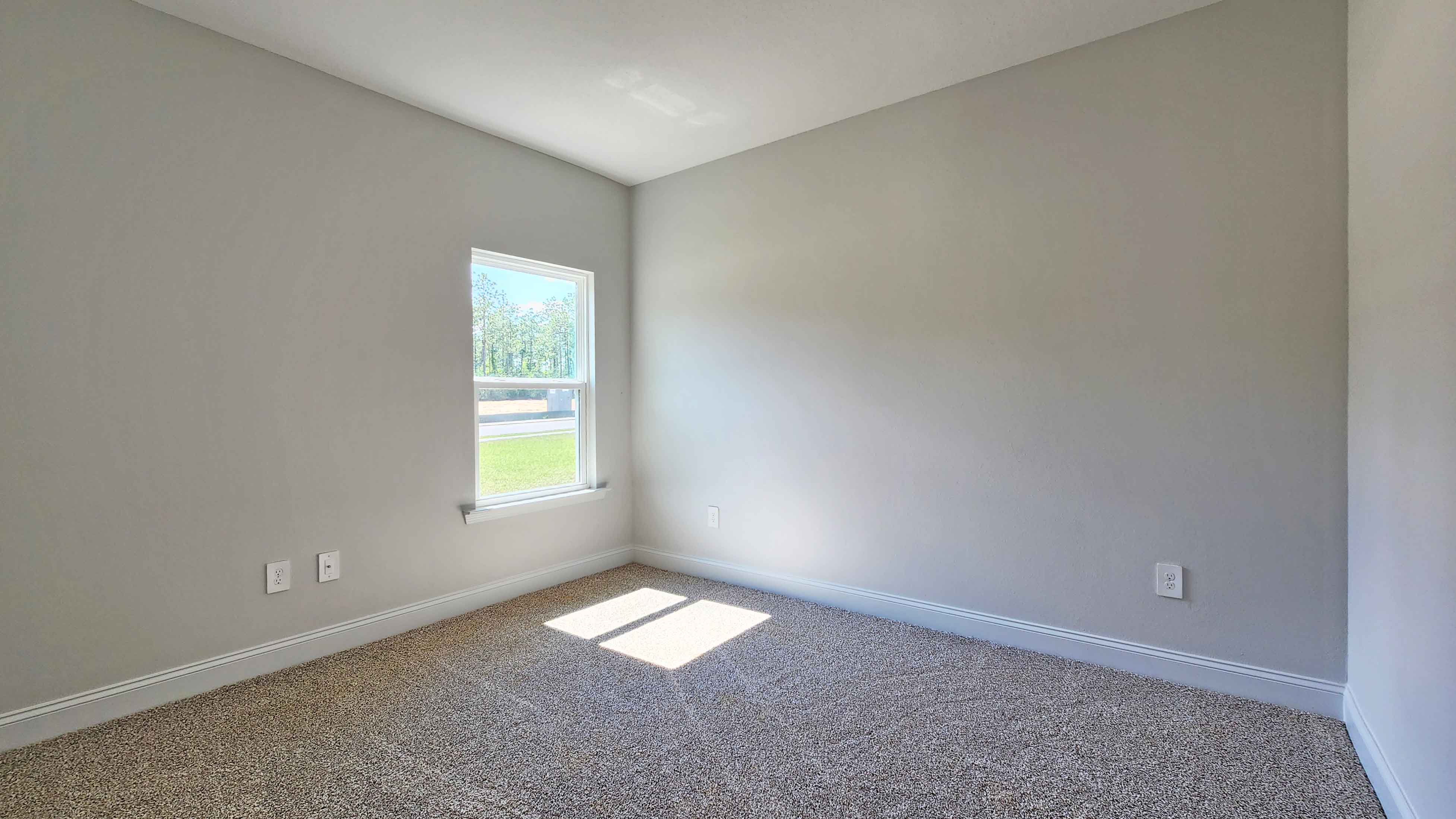 The Destin guest bedroom in Crane Landing.