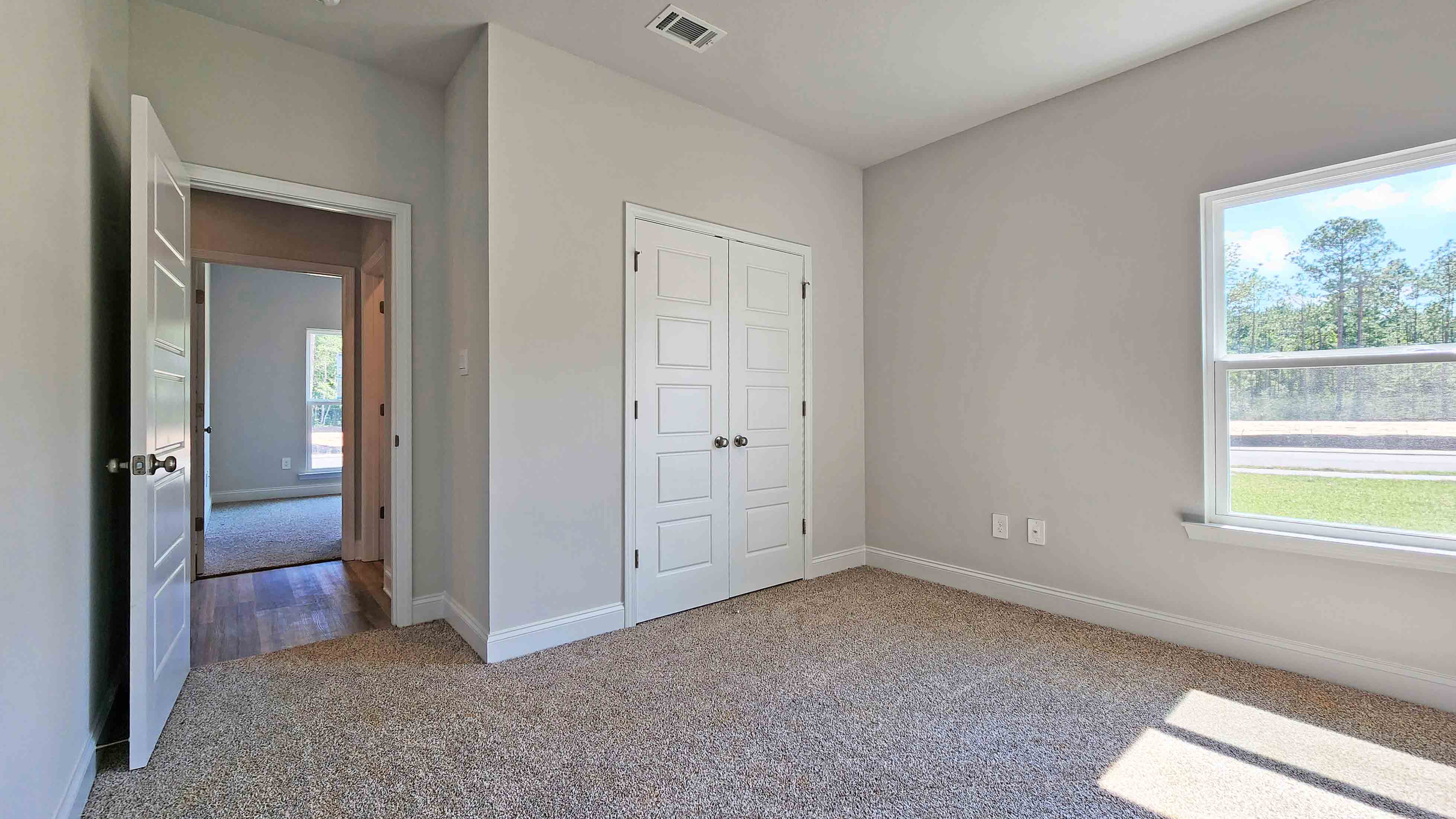 The Destin guest bedroom in Crane Landing.