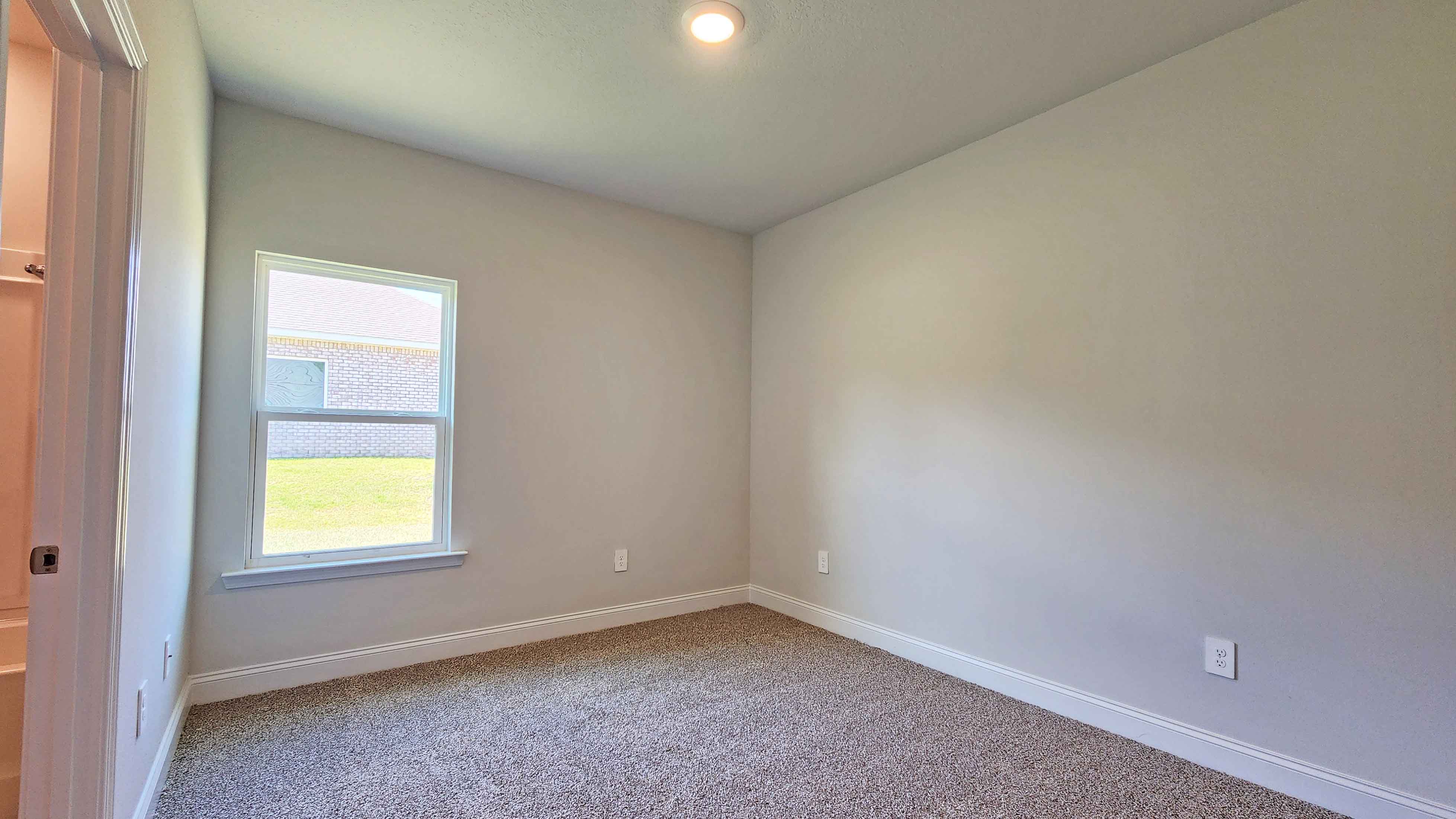 The Destin guest bedroom in Crane Landing.