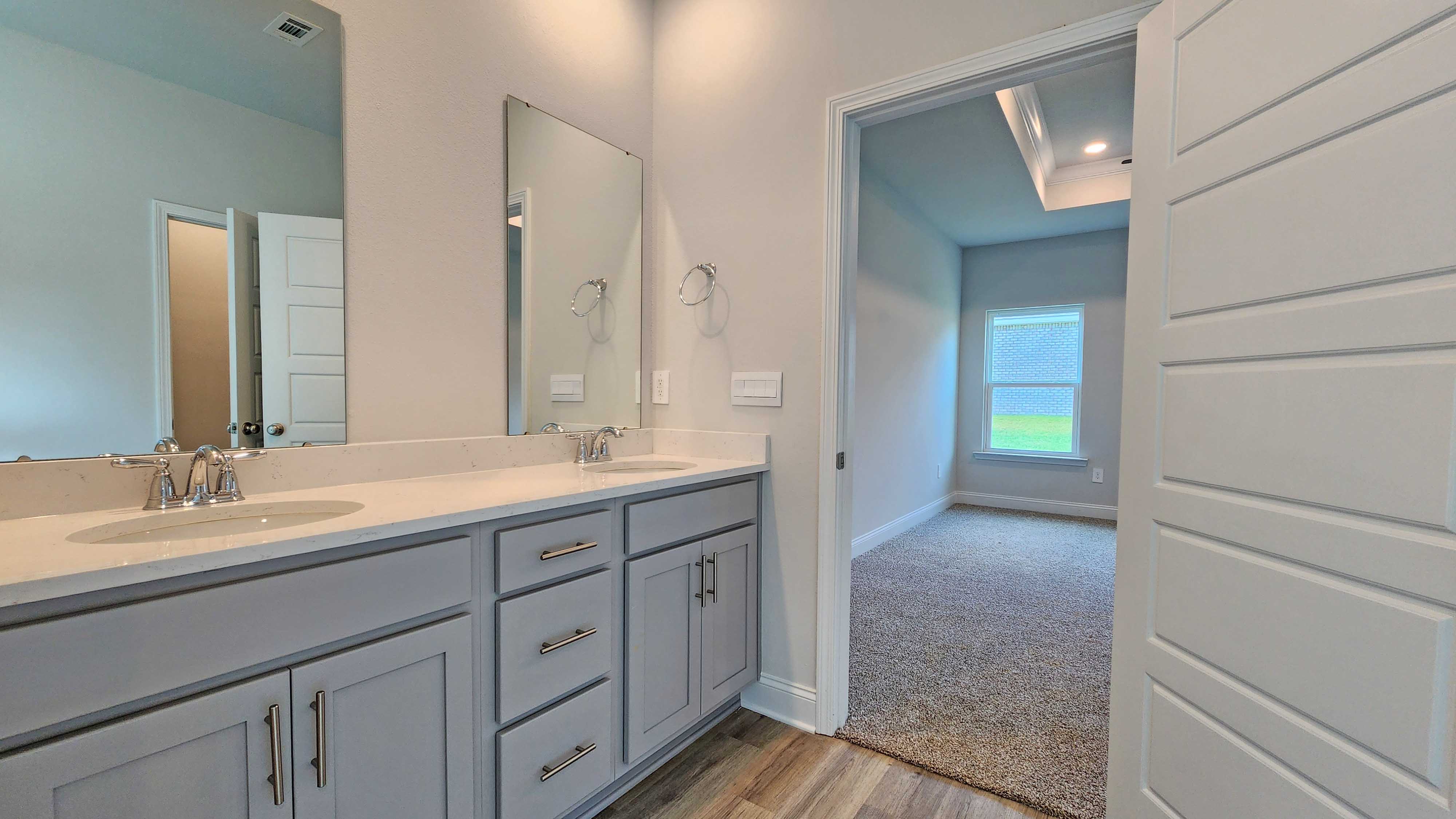 The Destin primary bath in Crane Landing.