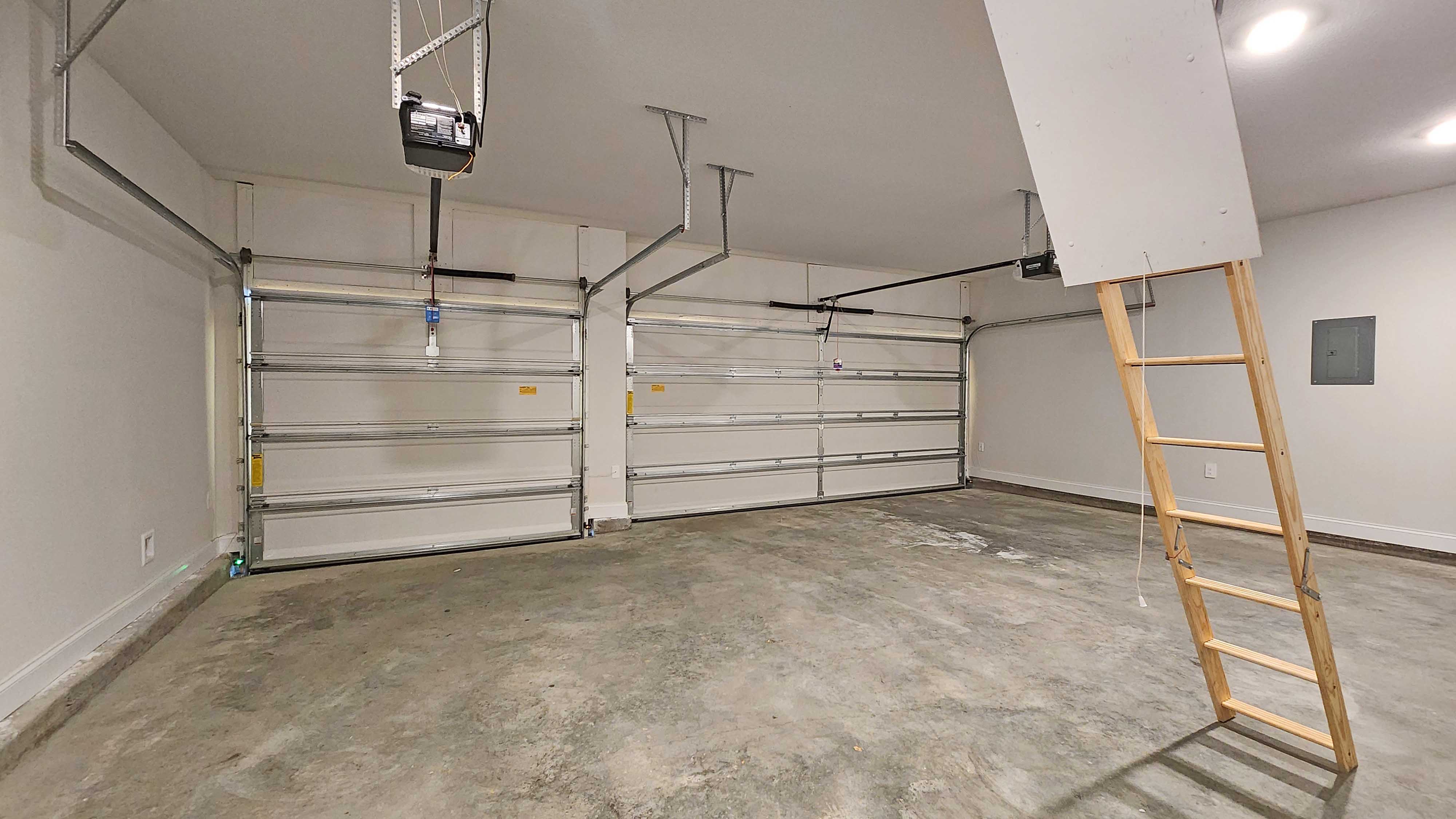 The Destin three car garage in Crane Landing.