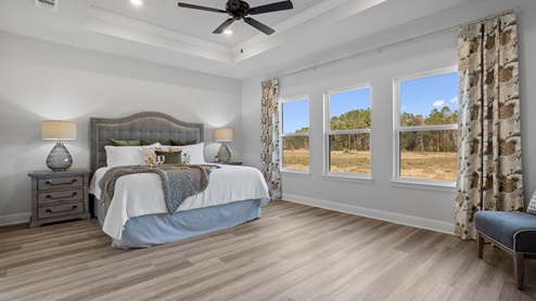 Primary bedroom of the Camden plan at Crane Landing.
