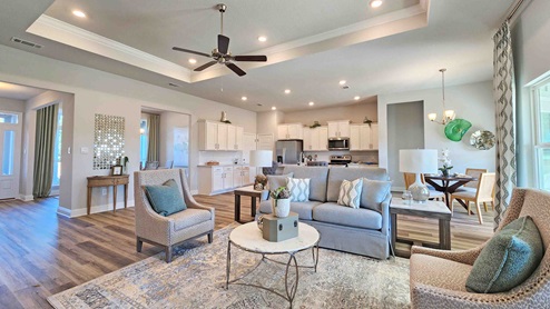 Emma living room with open concept to kitchen and breakfast area.