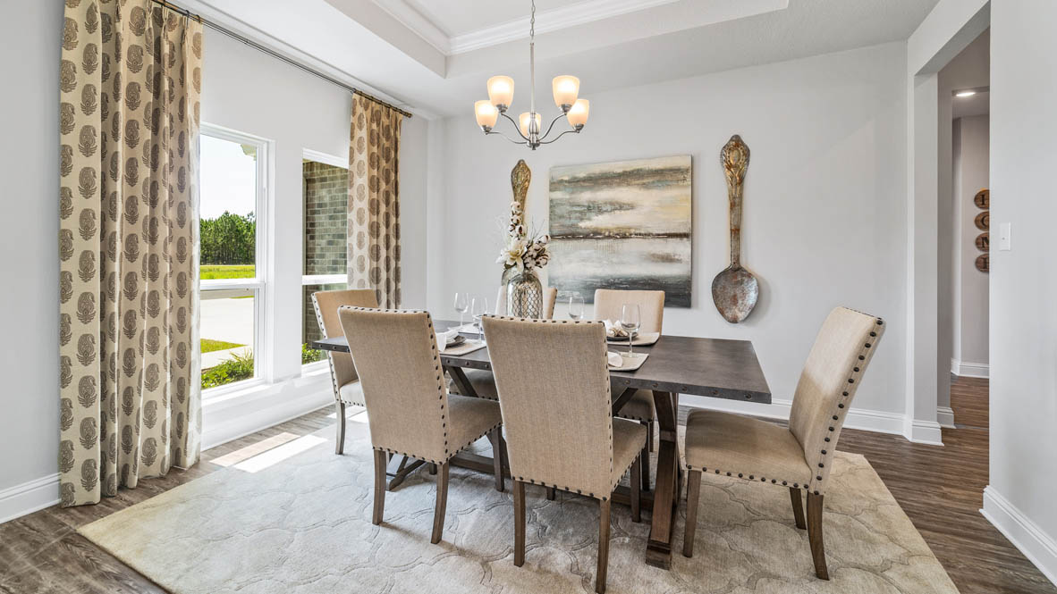 Dining area with open-concept layout and luxury finishes in Sumrall.