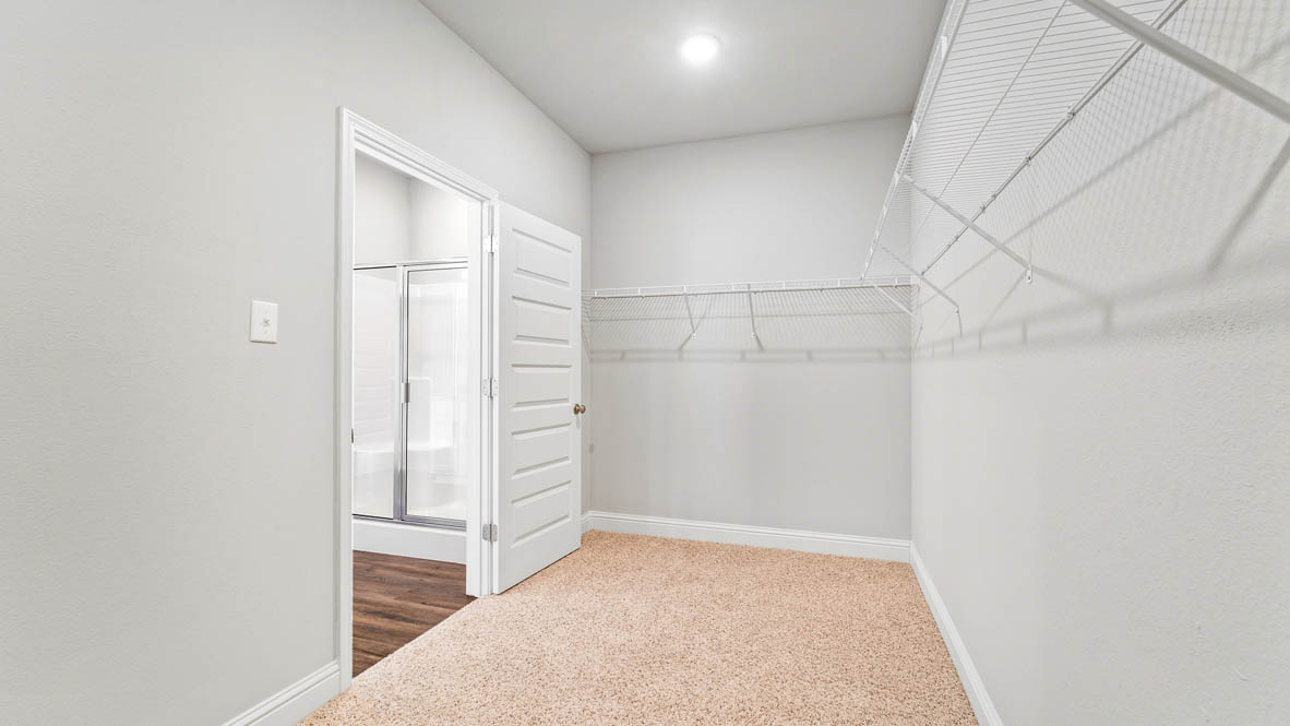 The Mila primary walk-in closet at Epley Station.