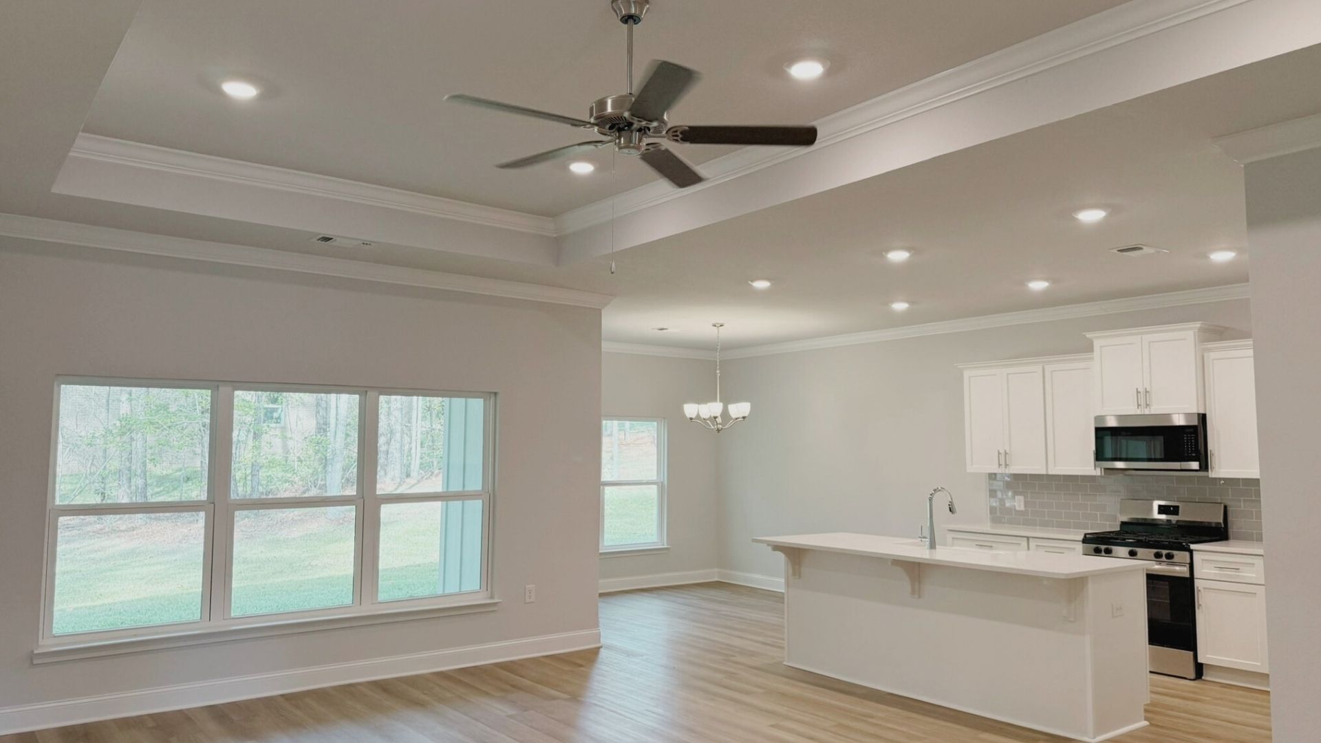 Living room with view of kitchen.