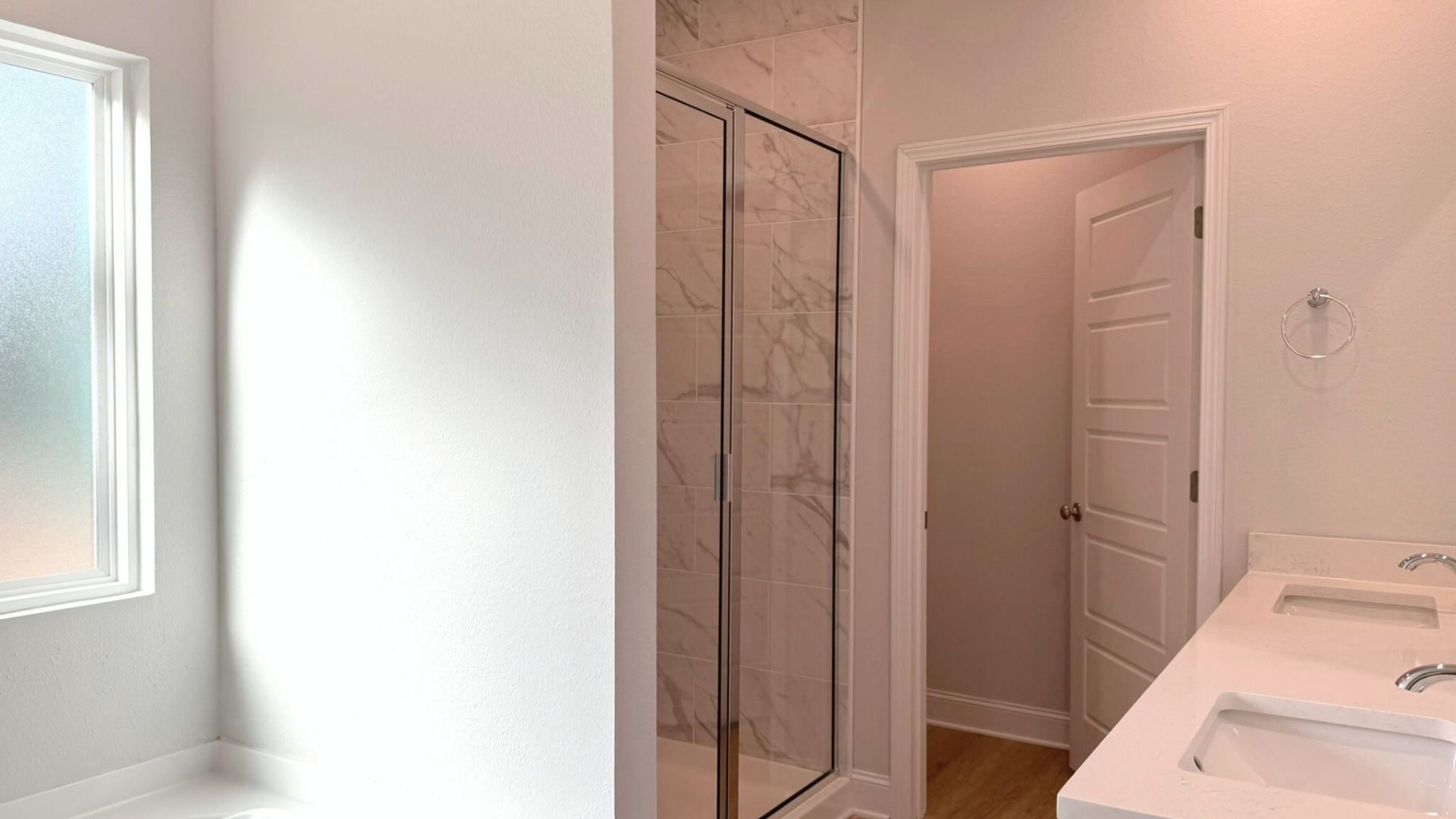 Bathroom with dual vanity sinks.