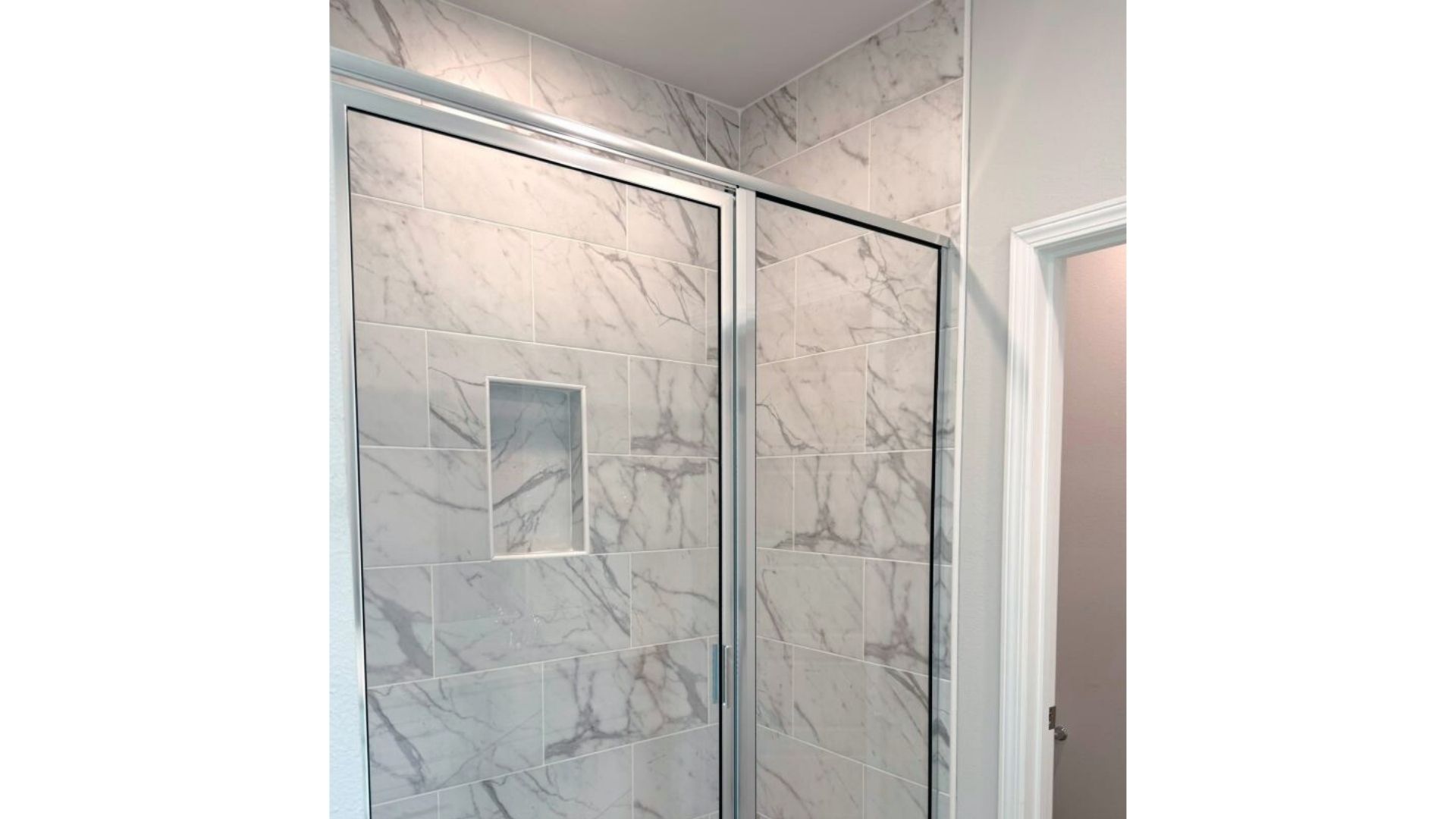 Bathroom with a large walk in shower.