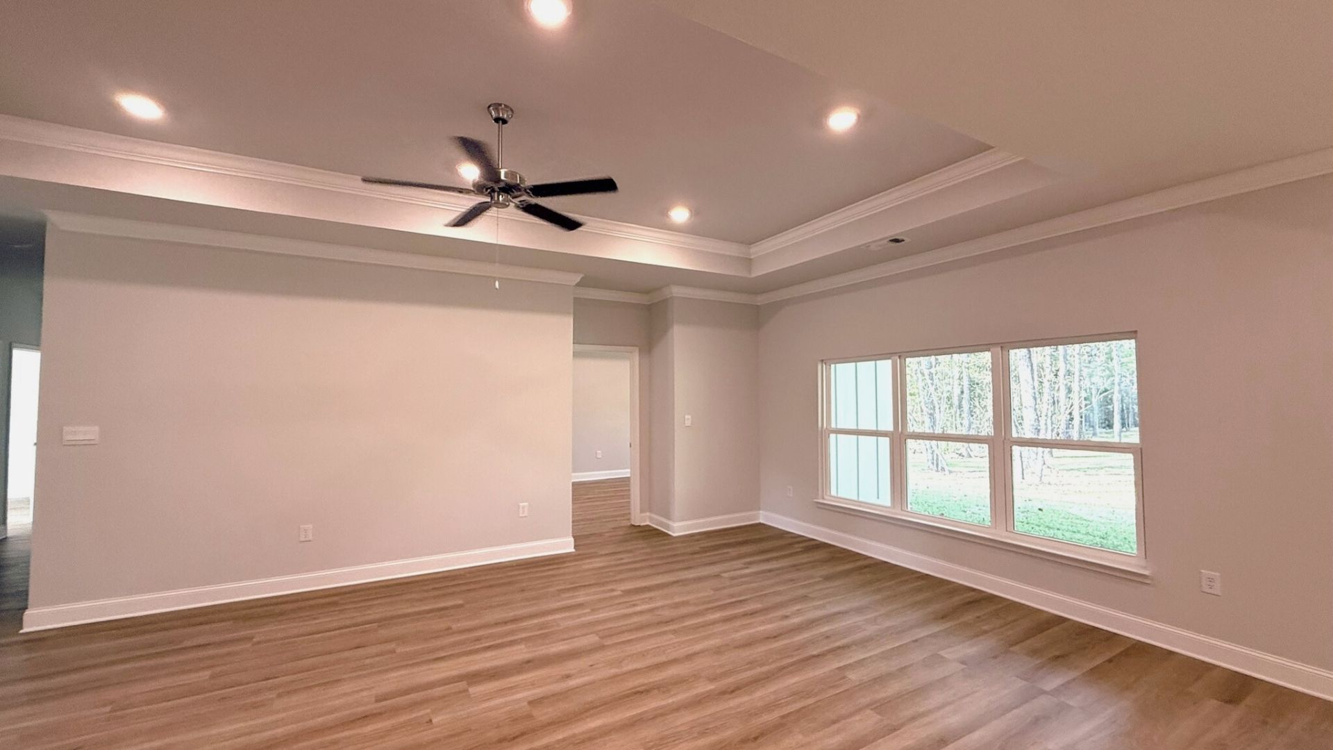 Living room with windows for natural lighting.