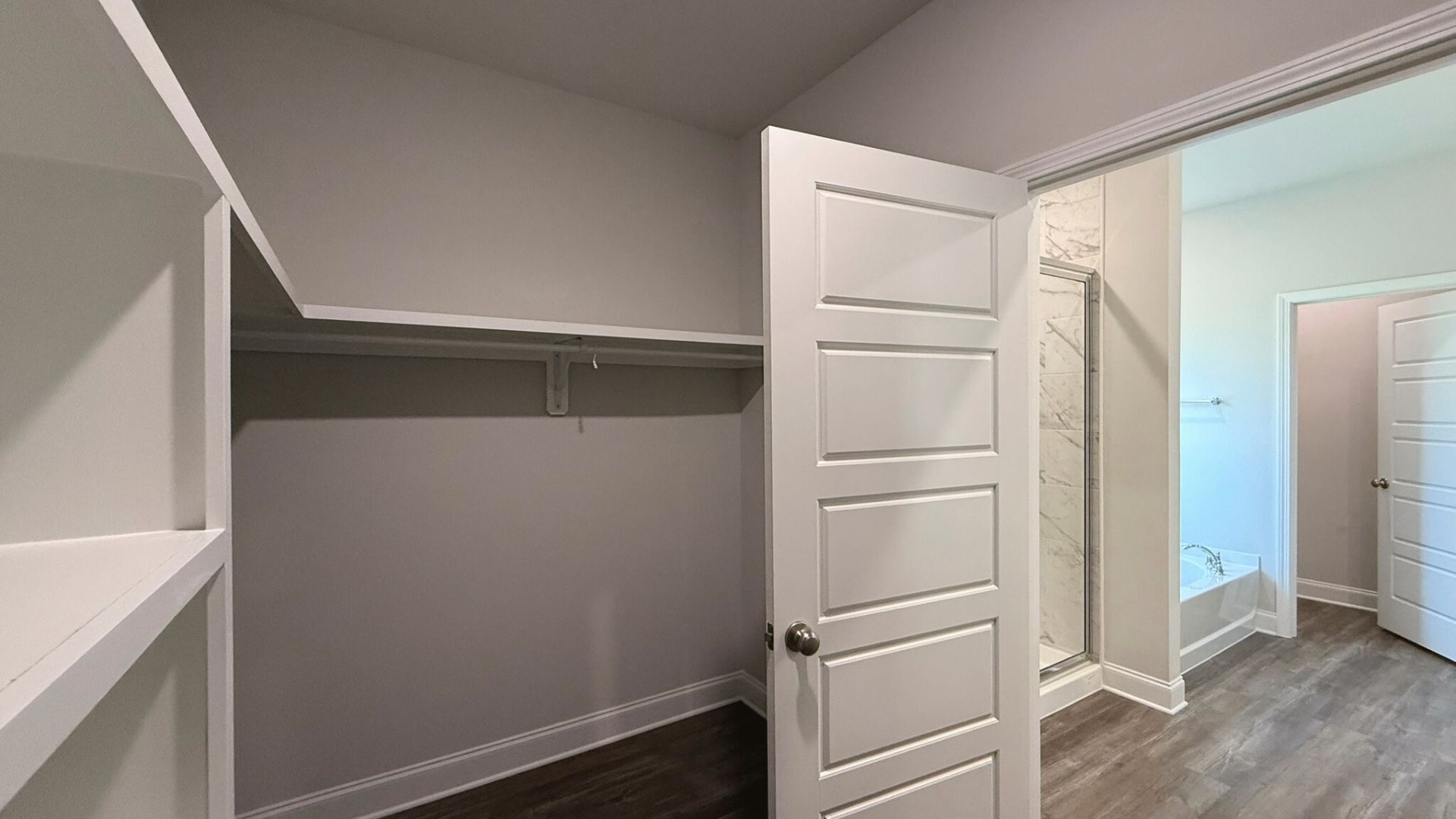 Spacious walk in closet.