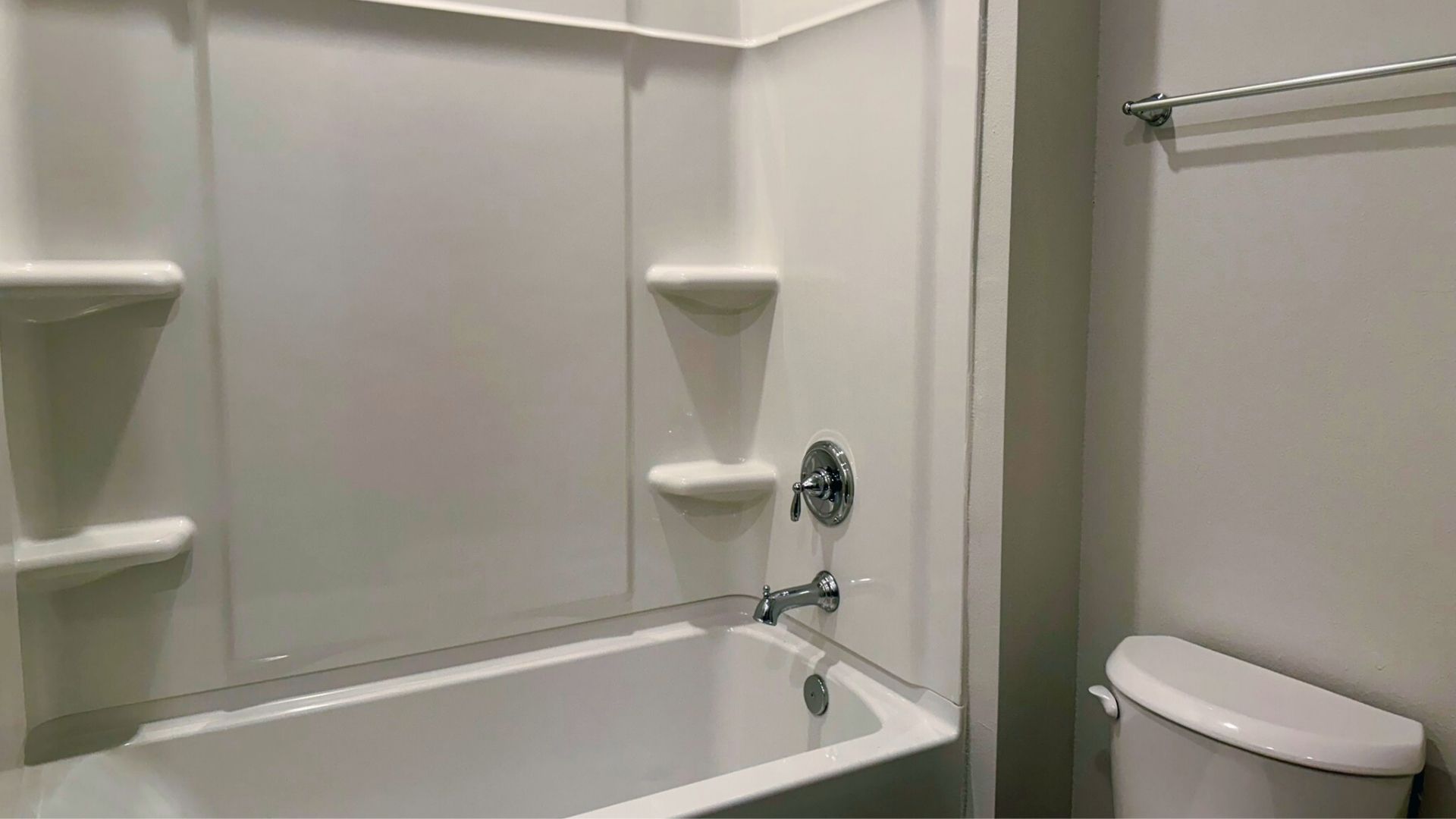 Bathroom with a step in shower.