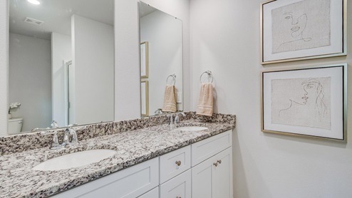 The Palm primary bathroom at Lost Garden Villas in Biloxi.