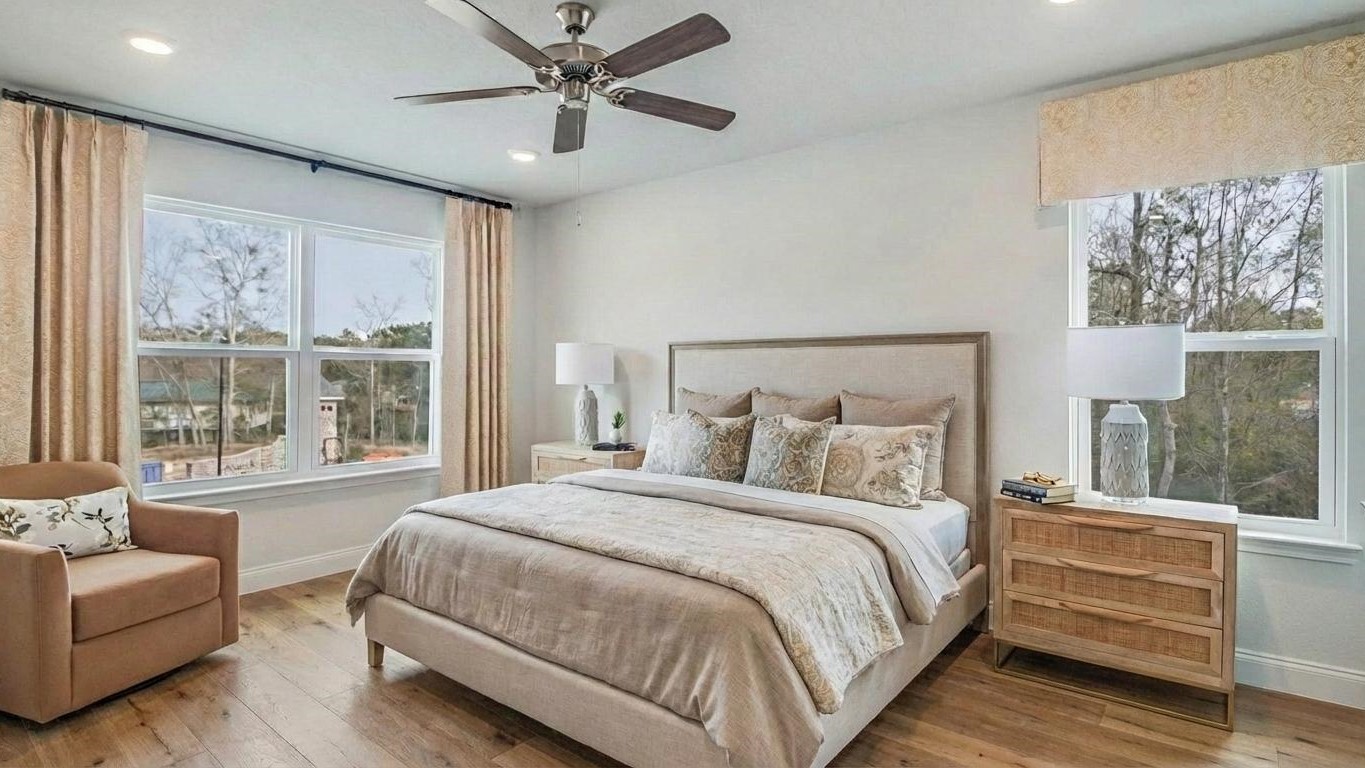 Primary bedroom with ceiling fan