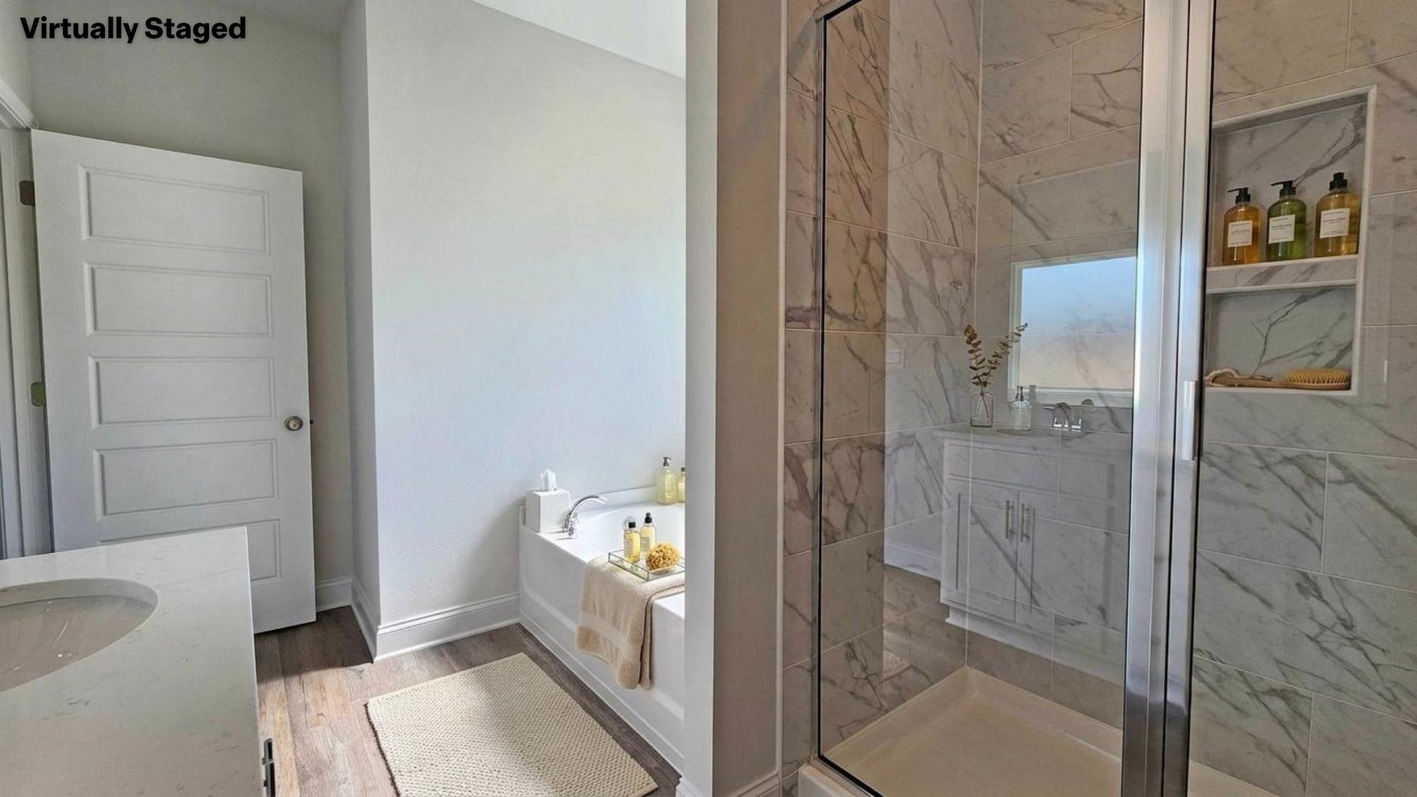 Primary bathroom with shower and tub