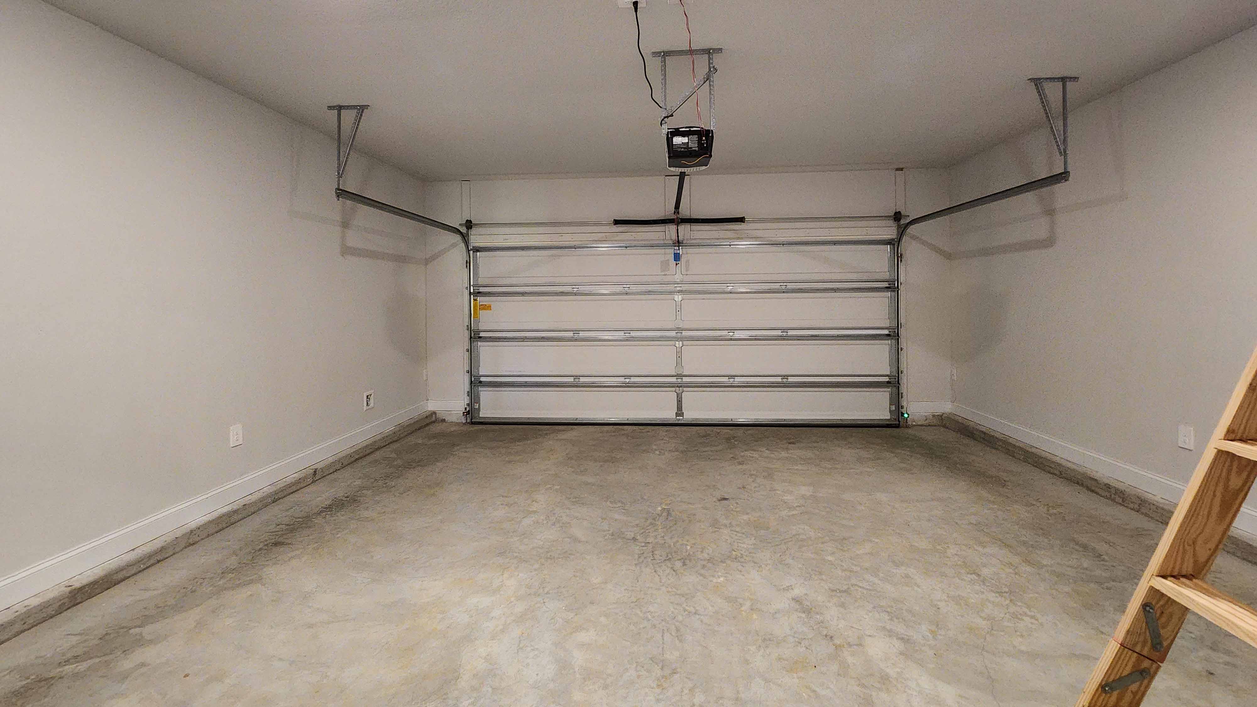 6.	Spacious two-car garage in a new D.R. Horton home in Castlewoods.