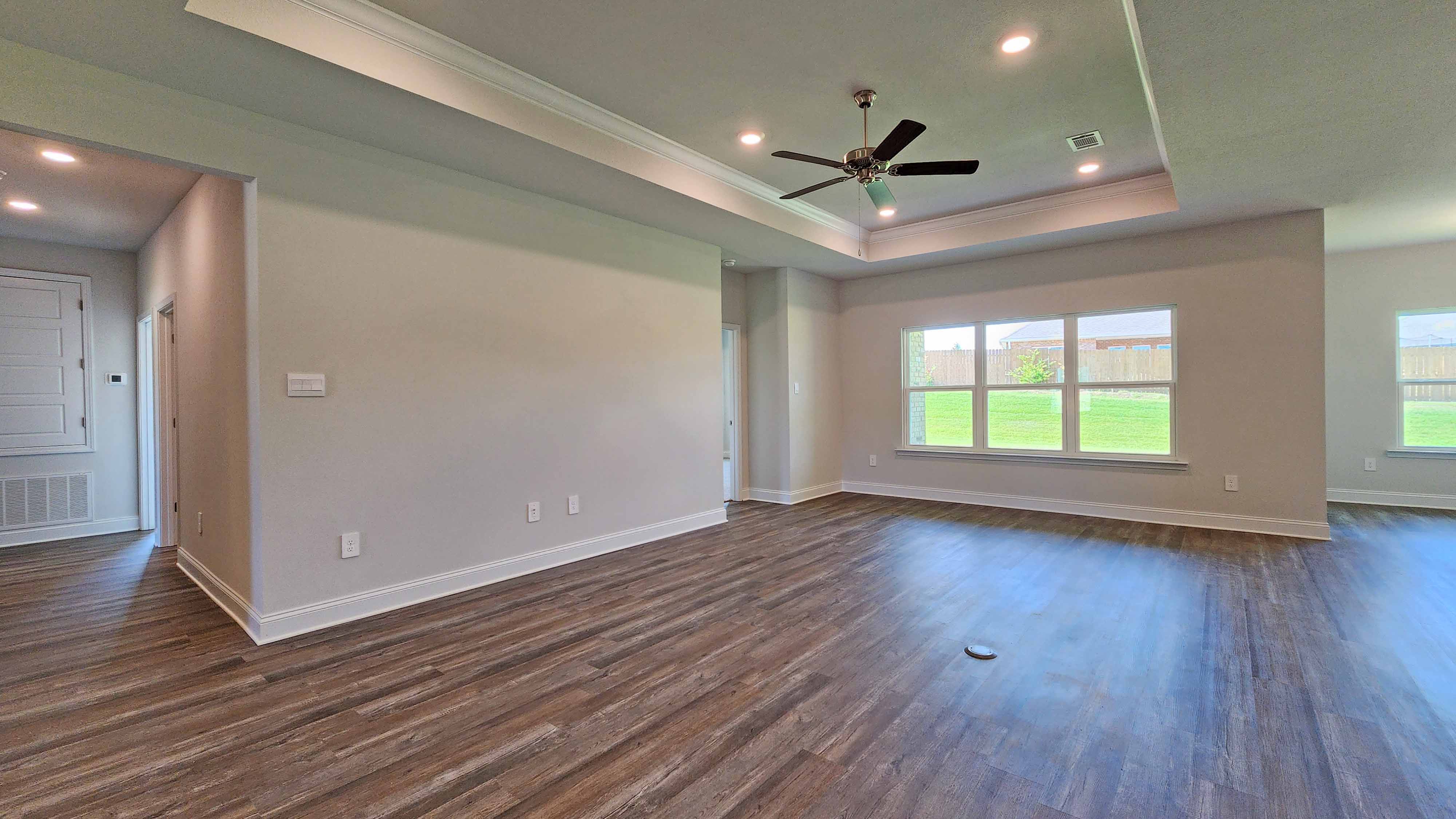 Well-lit and spacious great room in a D.R. Horton home in Petal.