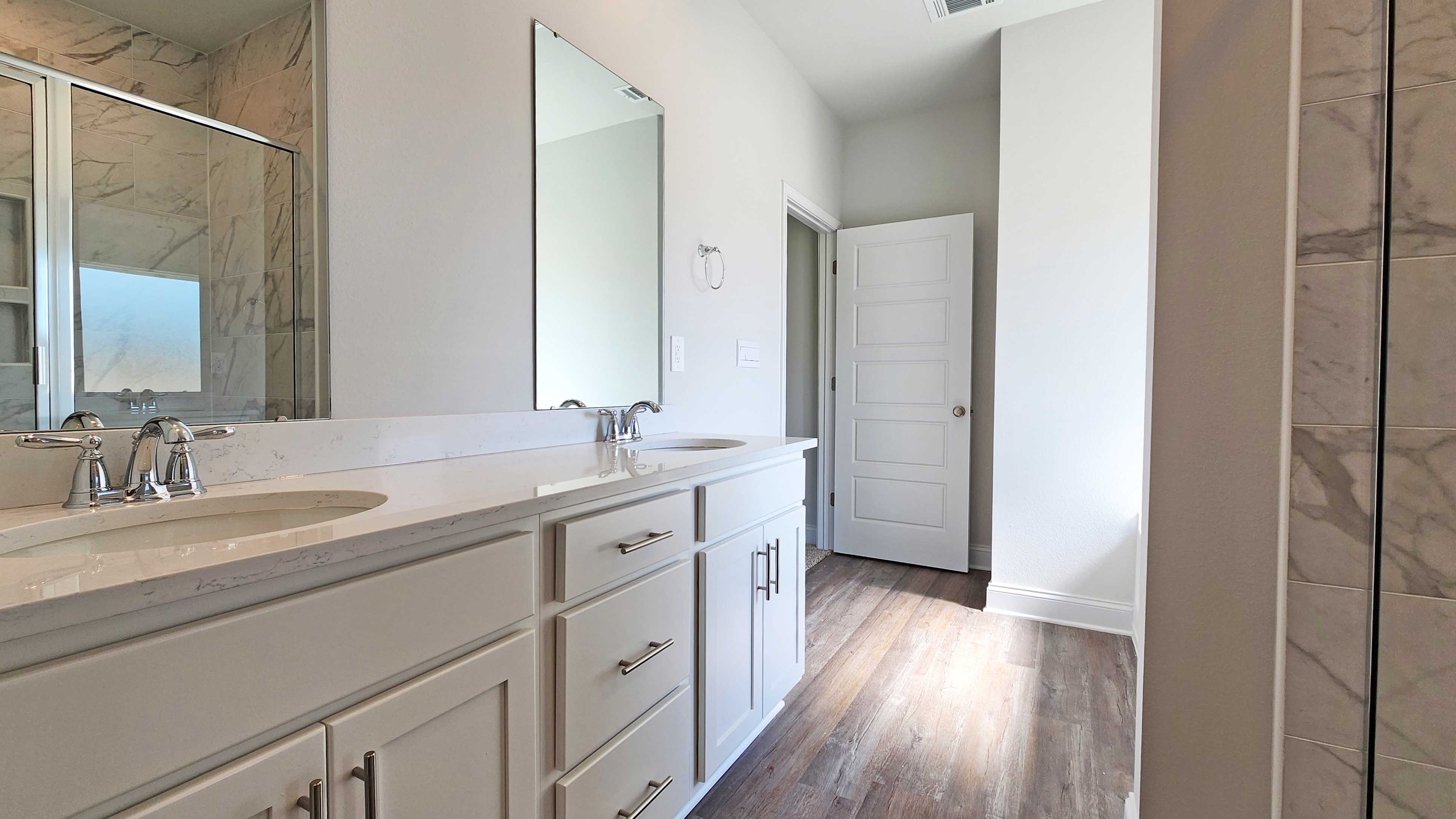 Spacious ensuite with luxury finishes and double sinks