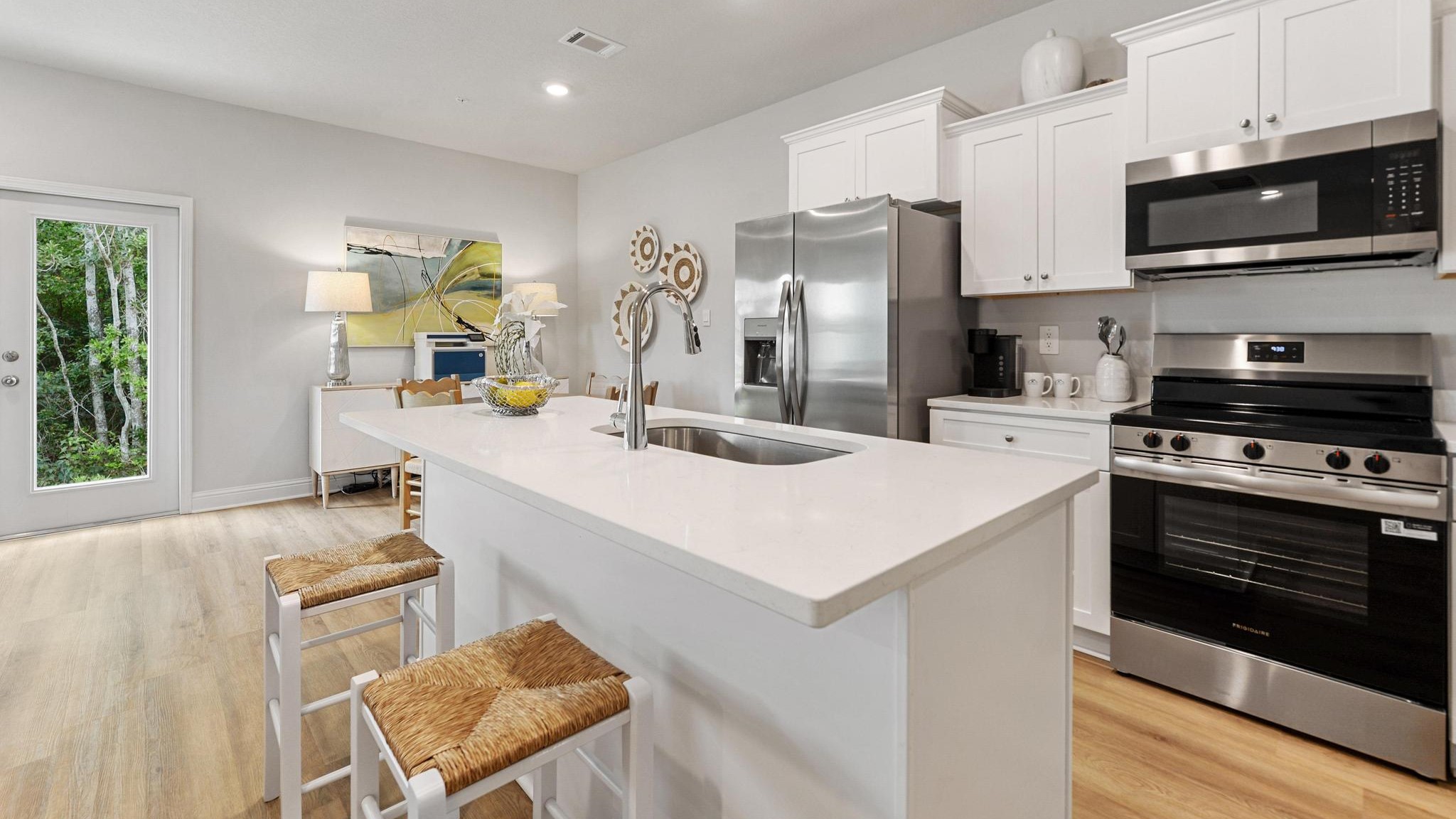 Open kitchen with stainless steel appliances