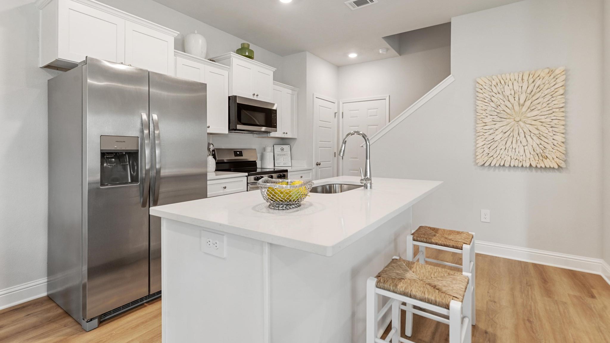Kitchen with island and stools